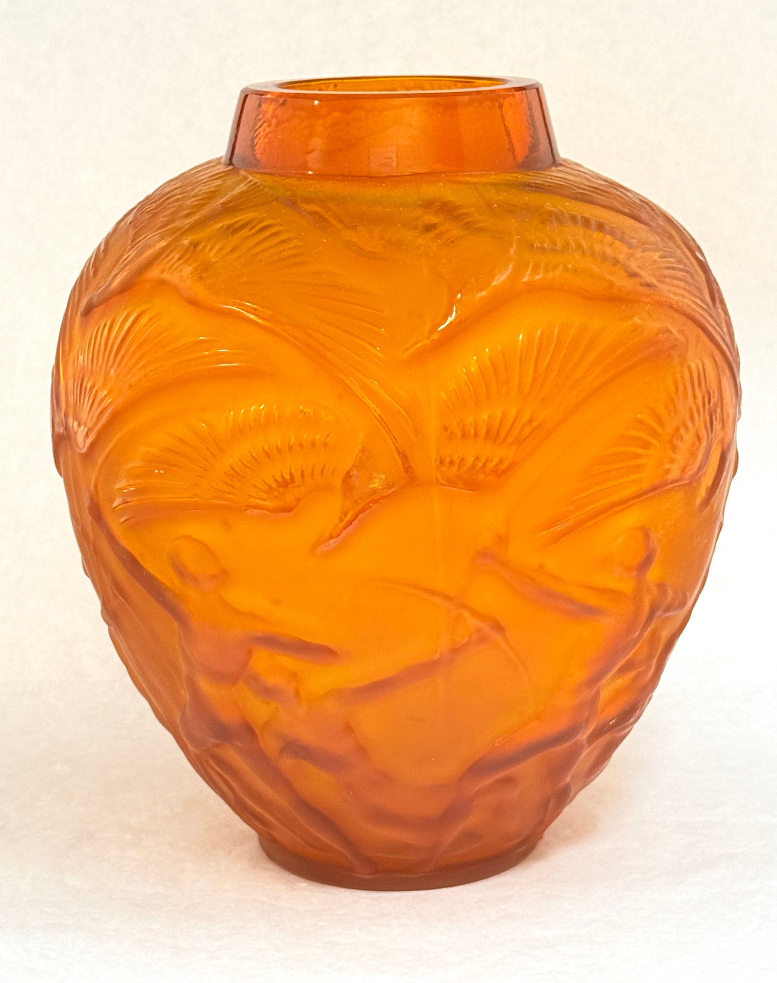 Lalique Style Archers Vase: Lalique style Archers vase in amber, ht. 11"; signed R. Lalique. CONDITION: no chips, cracks, repairs, or material defects found, Jaremos attempts to call any material flaw that affects the price, but