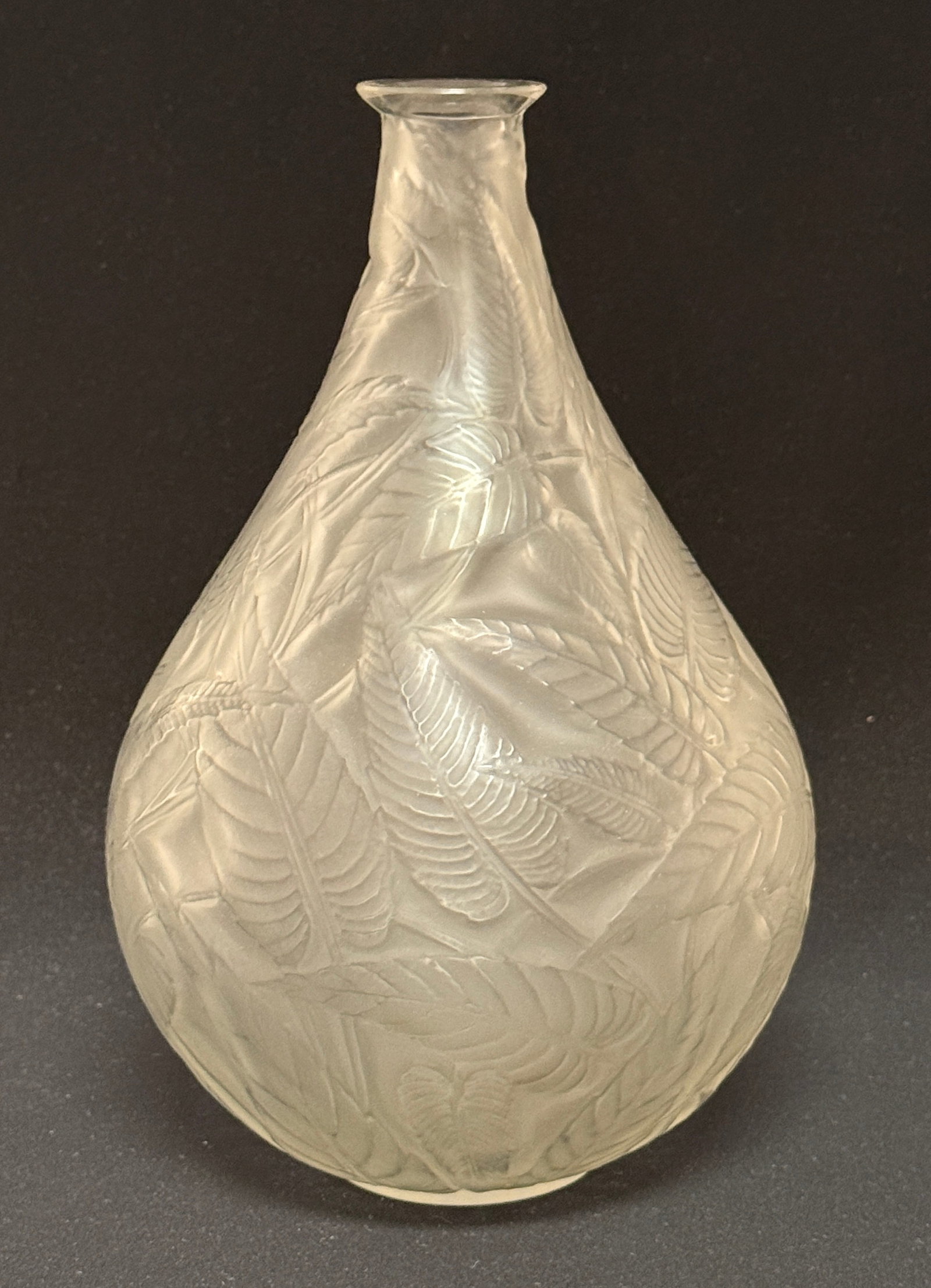 Lalique Clear Frosted Sage Vase: Lalique clear frosted Sage vase, ht. 10 1/4"; signed R. Lalique. CONDITION: chip on rim and cloudy spot on body, see picture.
