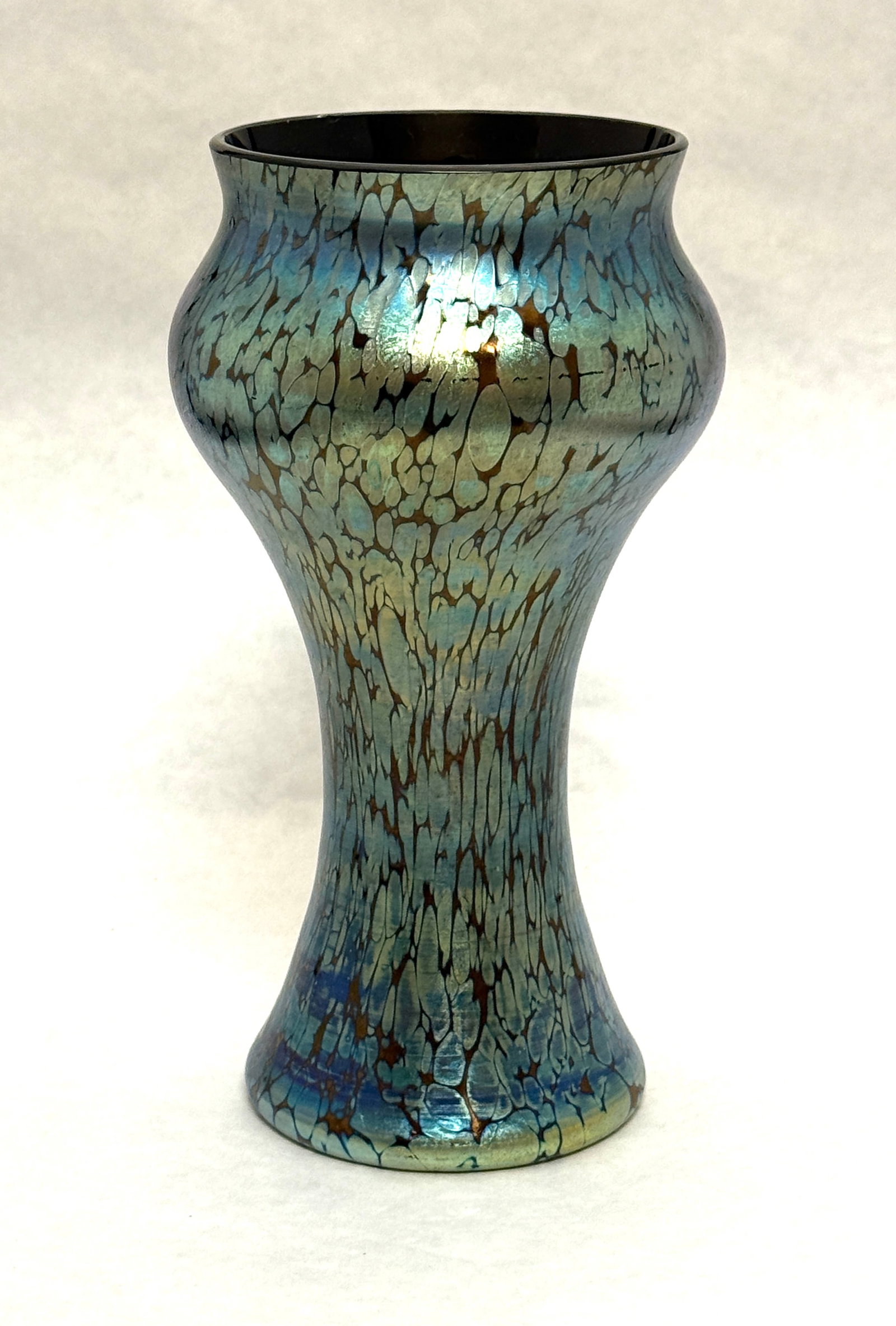 Loetz Blue Oil Spot Corset Vase: Loetz blue oil spot corset shape vase, ht 7 1/2". CONDITION: no chips, cracks, repairs, or material defects found, Jaremos attempts to call any material flaw that affects the price, but minor