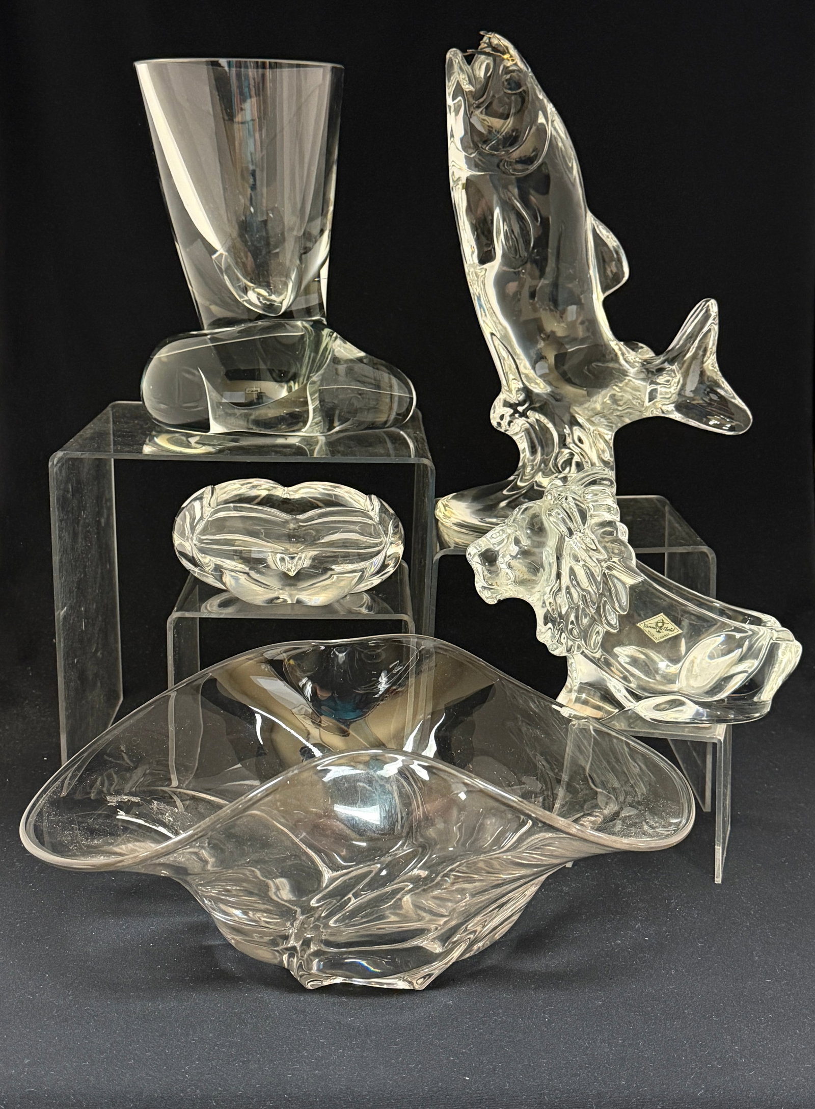 Grouping of Mid Century Glass: Five piece grouping of mid Century glass including a clear Duncan and Miller crimped Canterbury center bowl, a French Lion dish, a Swedish bowl, a Finish swirled vase and an Austrian fish produced for