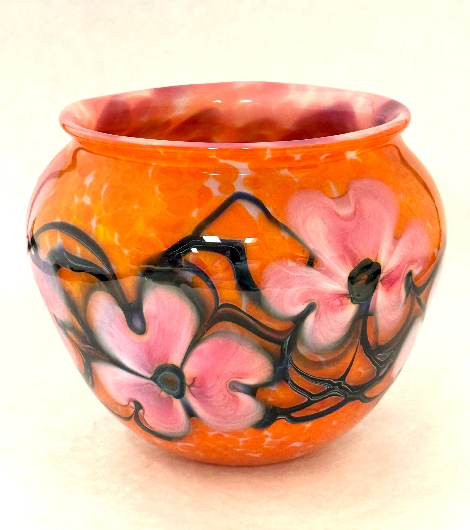 Lotton Multi-flora Vase: Lotton multi-flora vase with orange mottled background, signed Robert Lagestee Lotton 2018; diameter 5 1/2". CONDITION: no chips, cracks, repairs or material defects found, Jaremos attempts to call an