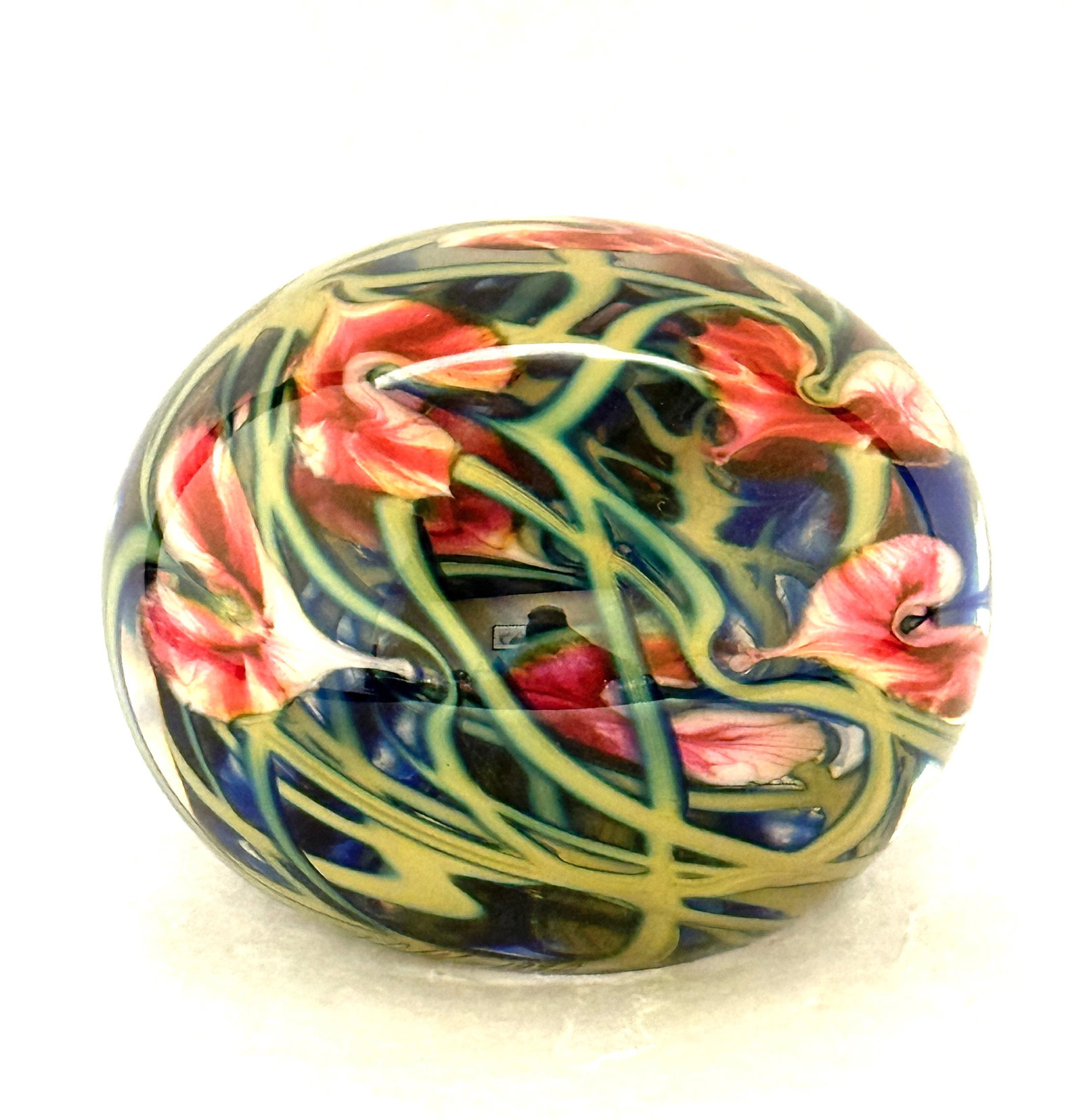 Large John Lotton Paperweight: Large John Lotton Multi flora paperweight in translucent glass decorated with a multitude of green stems and pink hearts, signed John Lotton 1990, 4 3/4" wide. CONDITION: no chips, cracks, repairs,