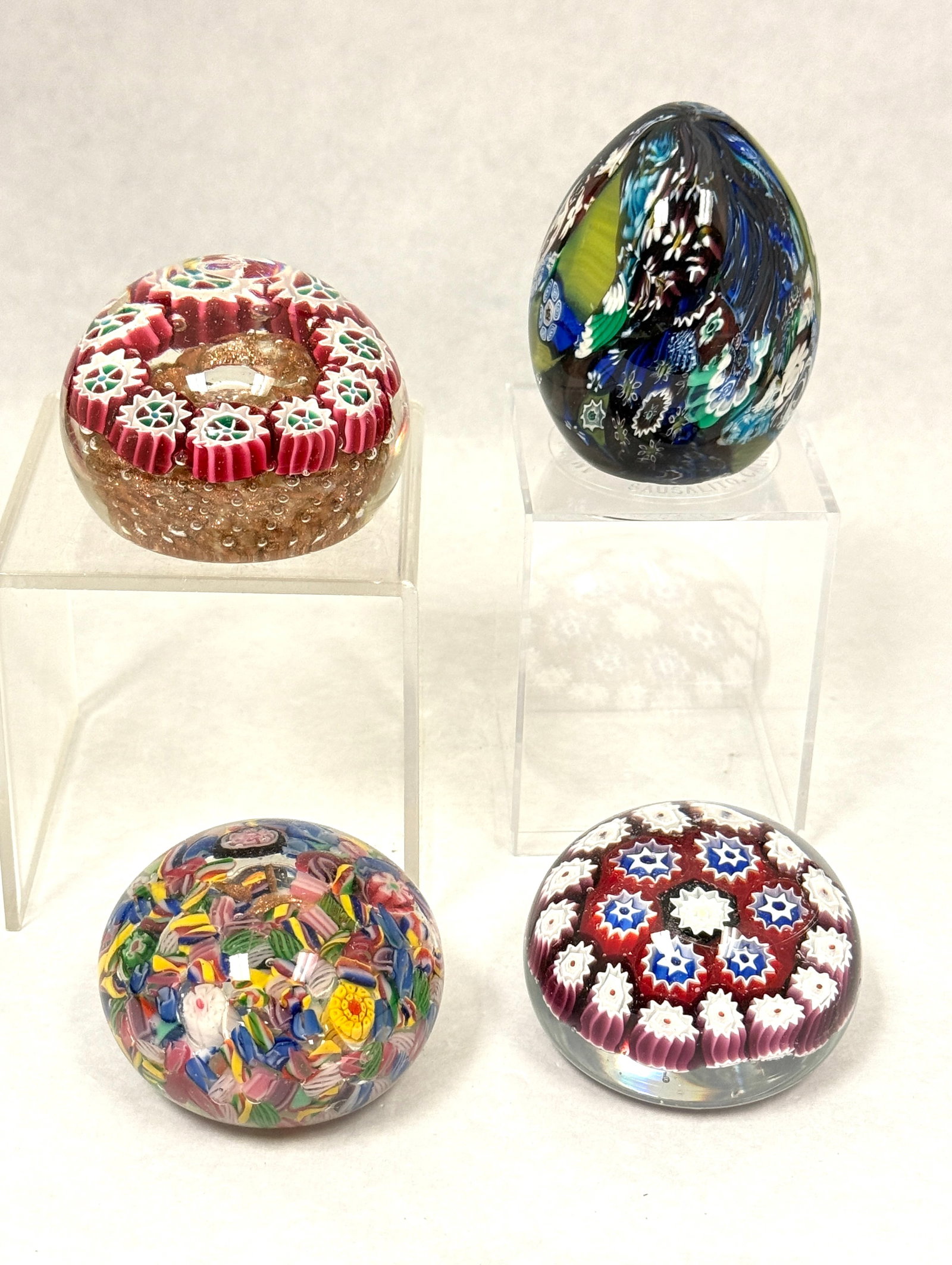 4 Millefiori Paperweights: 4 millefiori paperweights, ht. of egg 2 1/2". CONDITION: roughness to bottom edge of egg.