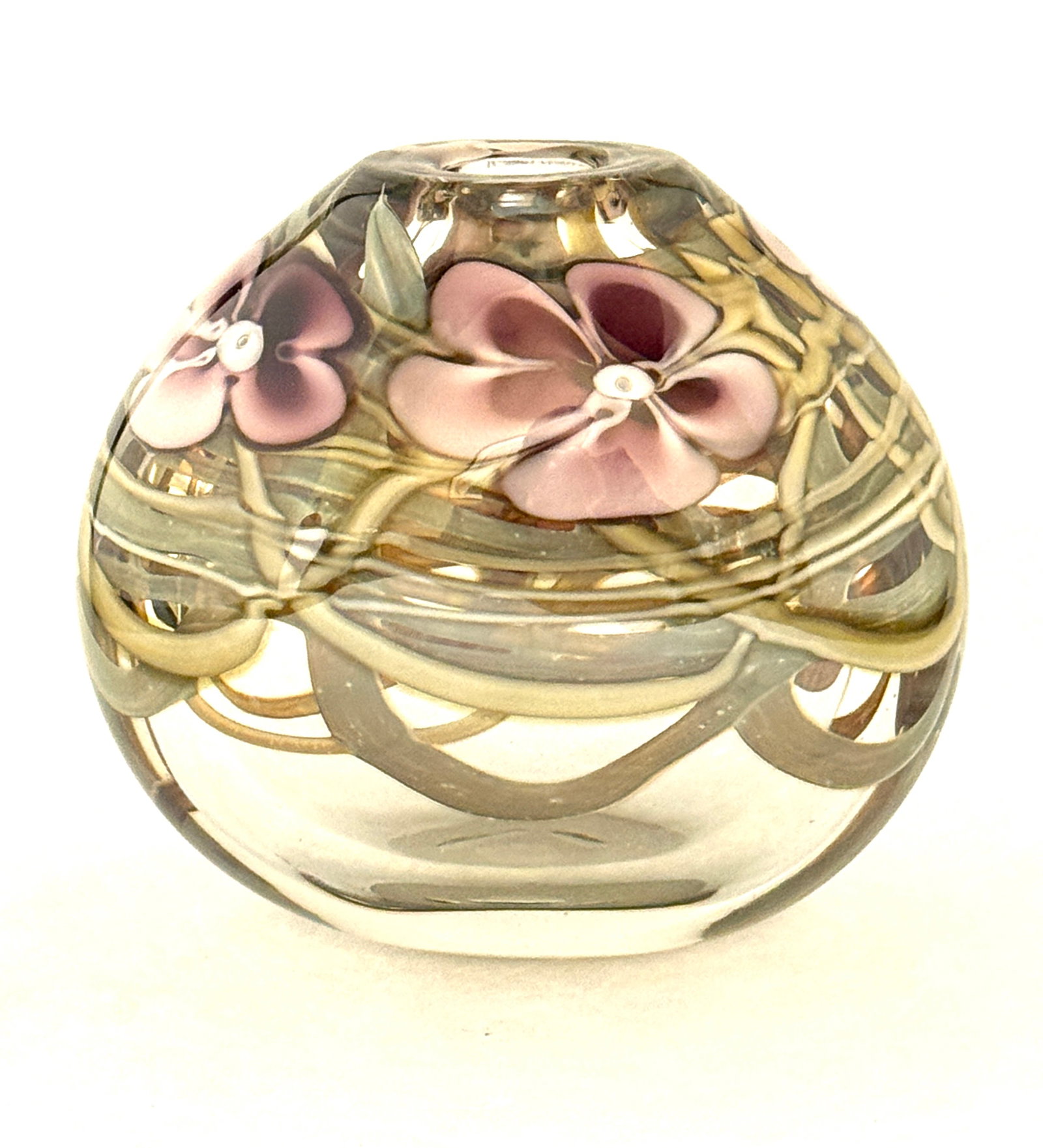 Rich Miller Paperweight Vase: Rich Miller translucent paperweight vase with random green stems and pink flower, signed Rich Miller 10-84, 5 1/4" ht. CONDITION: no chips, cracks, repairs, or material defects found, Jaremos
