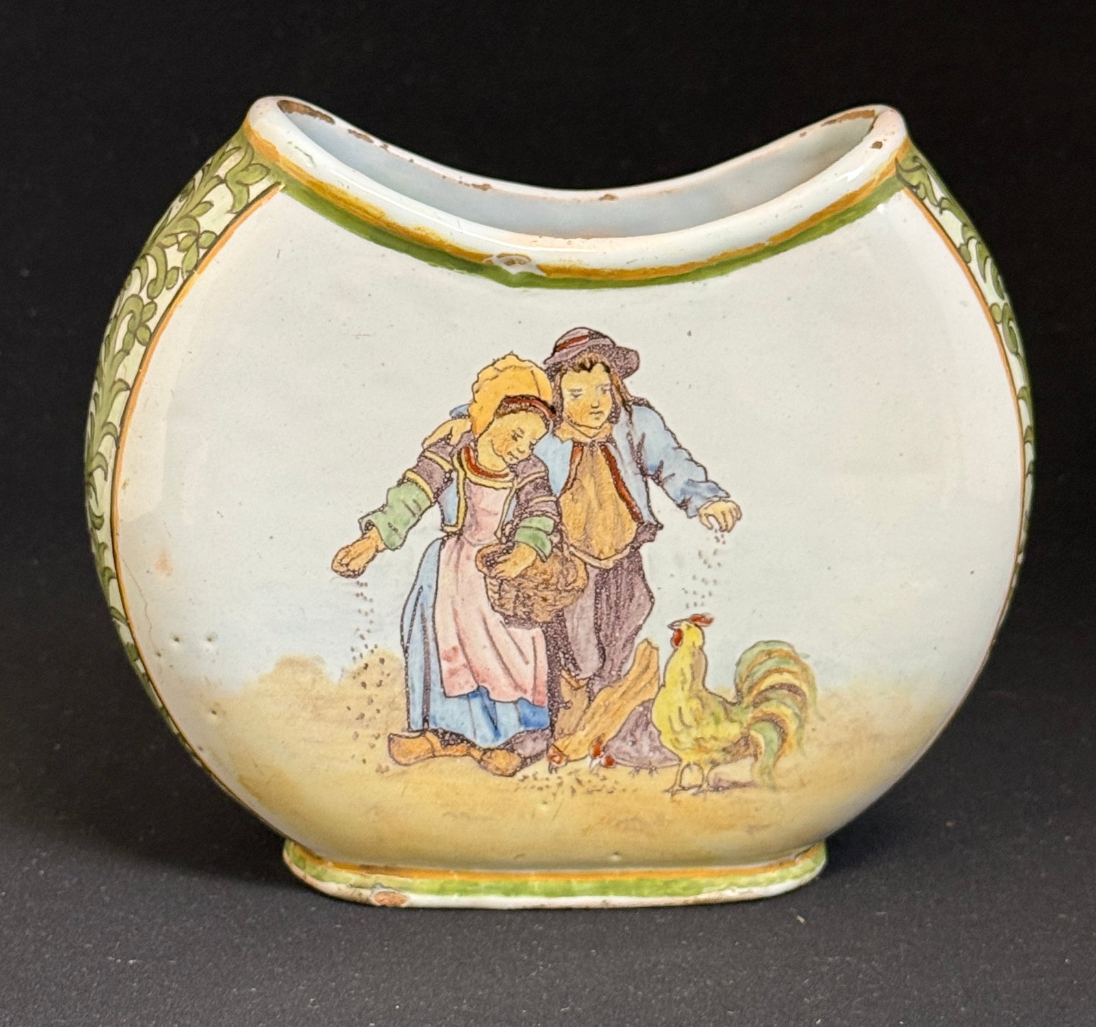 Porquier Beau Moon Vase: Porquier Beau Moon vase, circa 1875-1905, decorated with children feeding chickens with flowers on the reverse, ht. 5 1/2". LITERATURE: Tome II Encylopedie des Ceramiques de Quimper page 441 Planche n