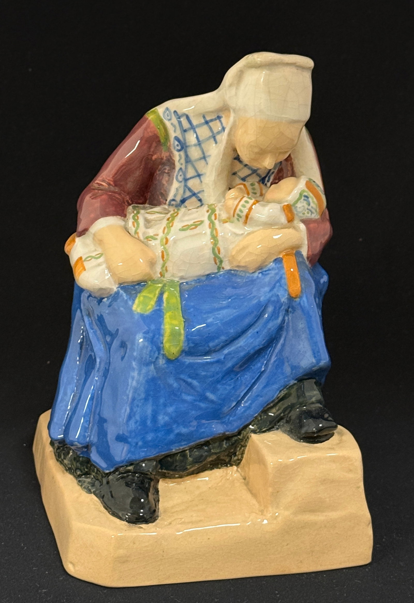 Rare HenRiot Quimper Figural: Rare HenRiot Quimper figural Bretonne from Plougastel and baby, signed Chevalier-Kervern; ht. 7 3/4". circa 1925. CONDITION: Quimper has propensity to have minor chips, glaze loss/wear and crazing. Ja