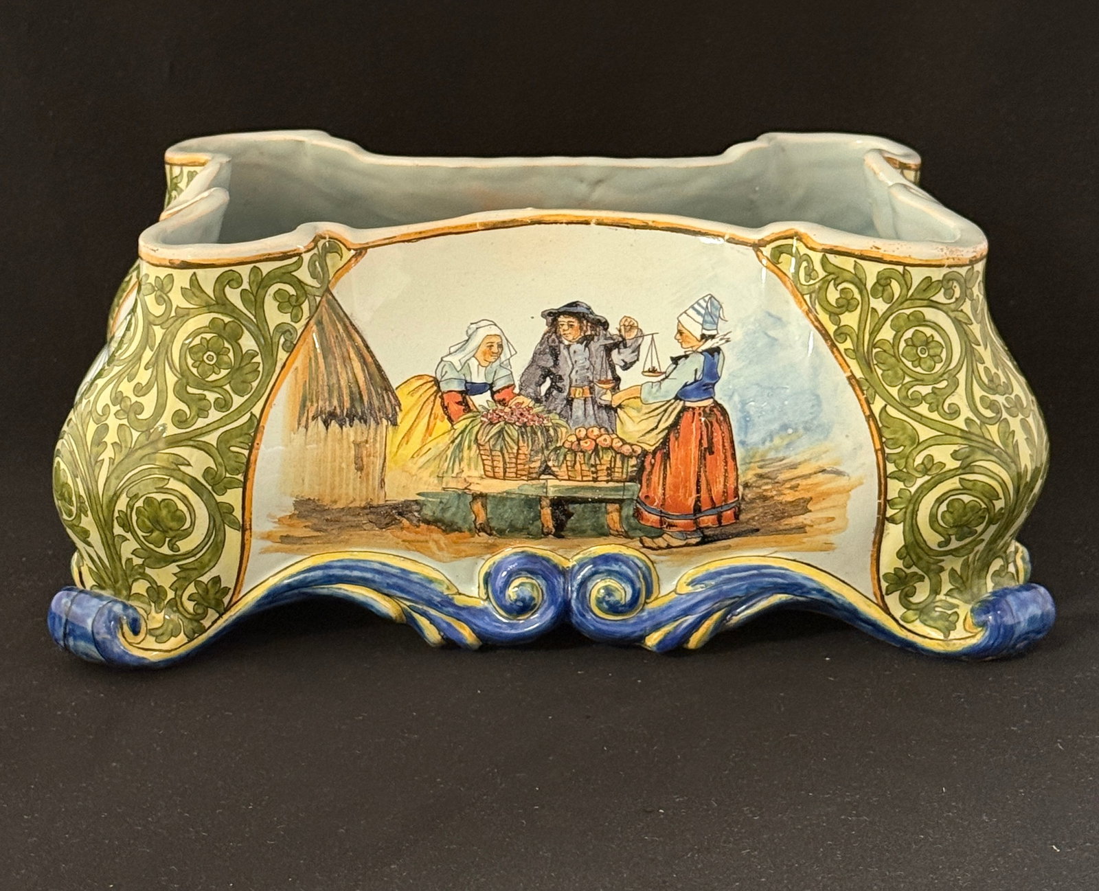 Porquier Beau Double Jardiniere: Porquier Beau double jardiniere with market scene and 2 Bretonnes and a Breton with florals on back and sides with scrolling feet and d?cor riche design on corners, "Ploneis"; length 11 1/2" circa