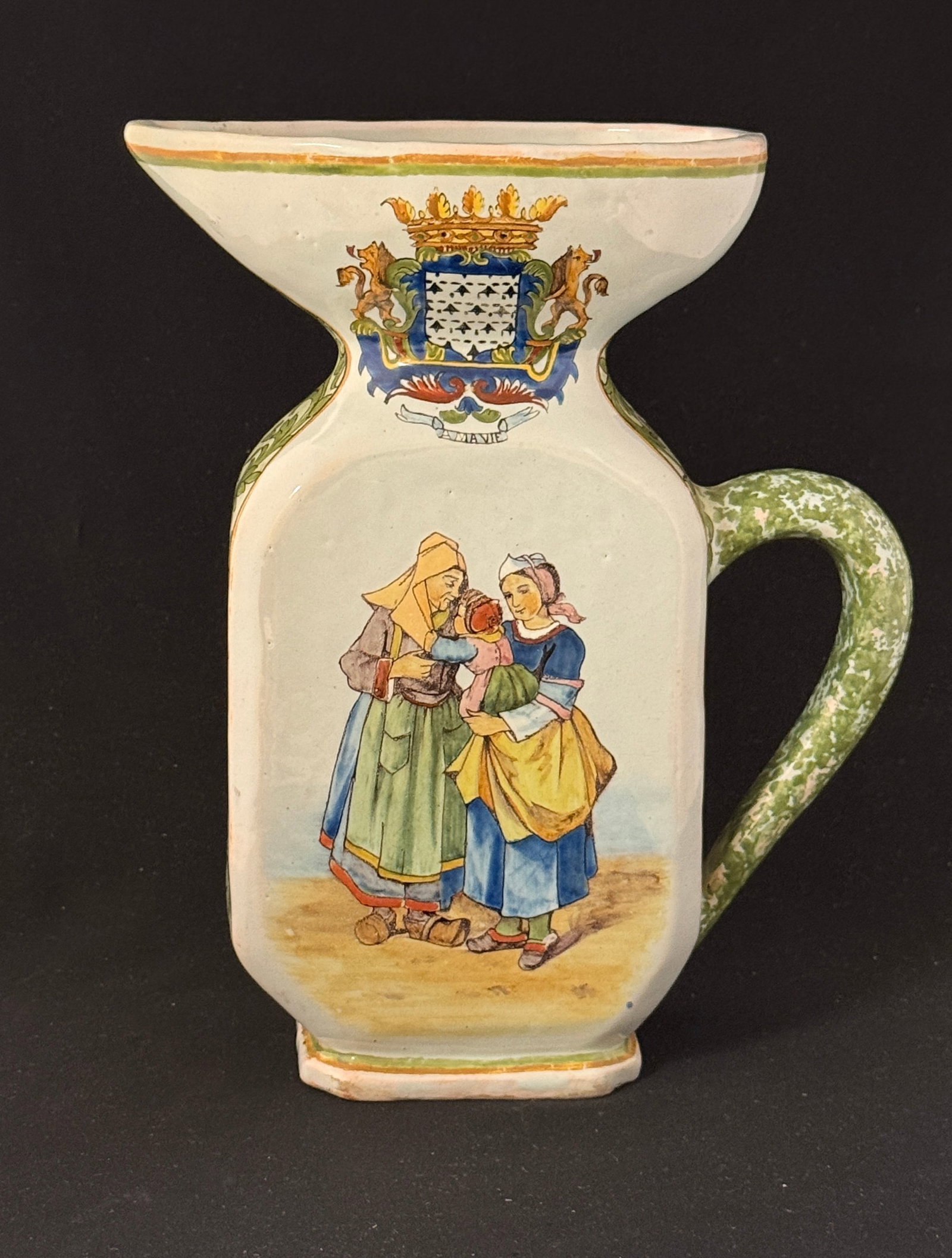 Porquier Beau Cider Pitcher: Porquier Beau cider pitcher with blasons of Quimper and Brittany, scene of mother, grandmother, and baby, back decorated with tulips; ht. 10 3/4" circa 1875 - 1905. LITERATURE: Tome II page 460