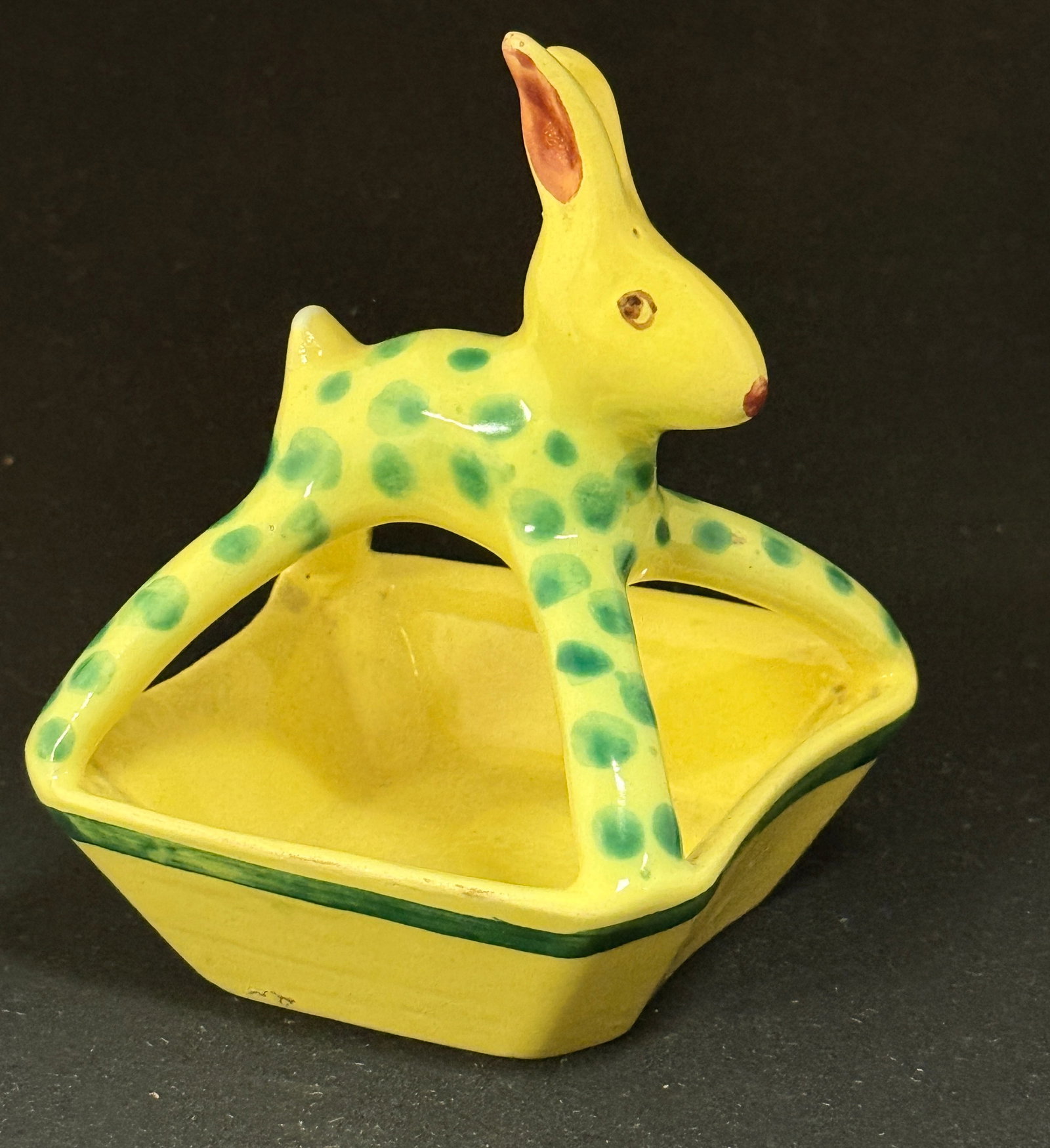 HB Quimper Polka Dot Rabbit: HB Quimper polka dot figural rabbit, yellow and green; ht. 4 1/2" circa1920-1950. CONDITION: Quimper has propensity to have minor chips, glaze loss/wear and crazing. Jaremos attempts to call any