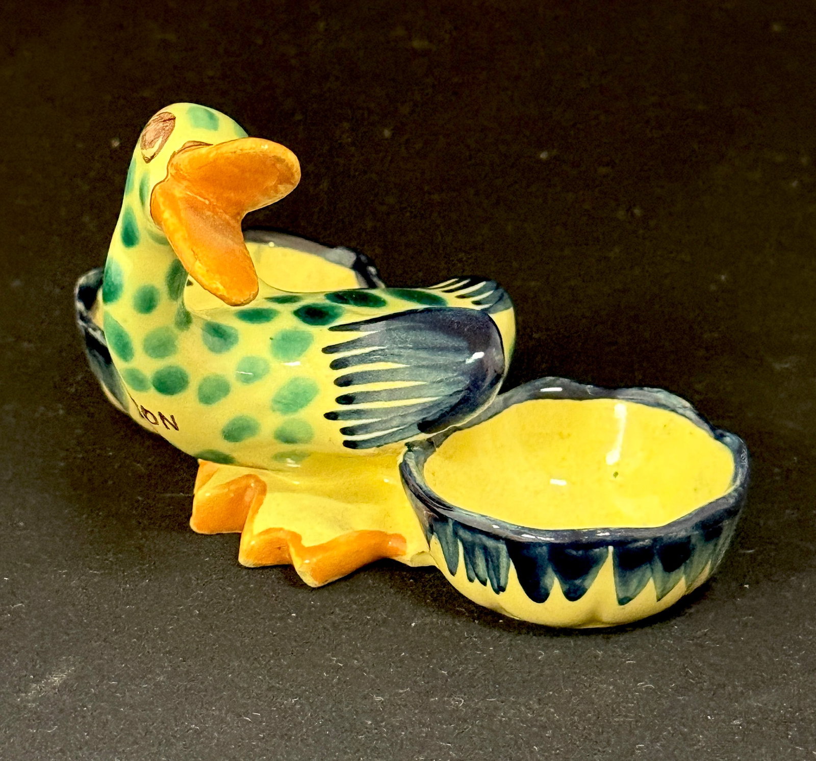 HB Quimper Polka Dot Duck: HB Quimper polka dot duck condiment, yellow, green and blue, a commissioned piece marked "Dijon" and Grey Poupon; ht. 3" circa 1920-1950. CONDITION: Quimper has propensity to have minor chips, glaze