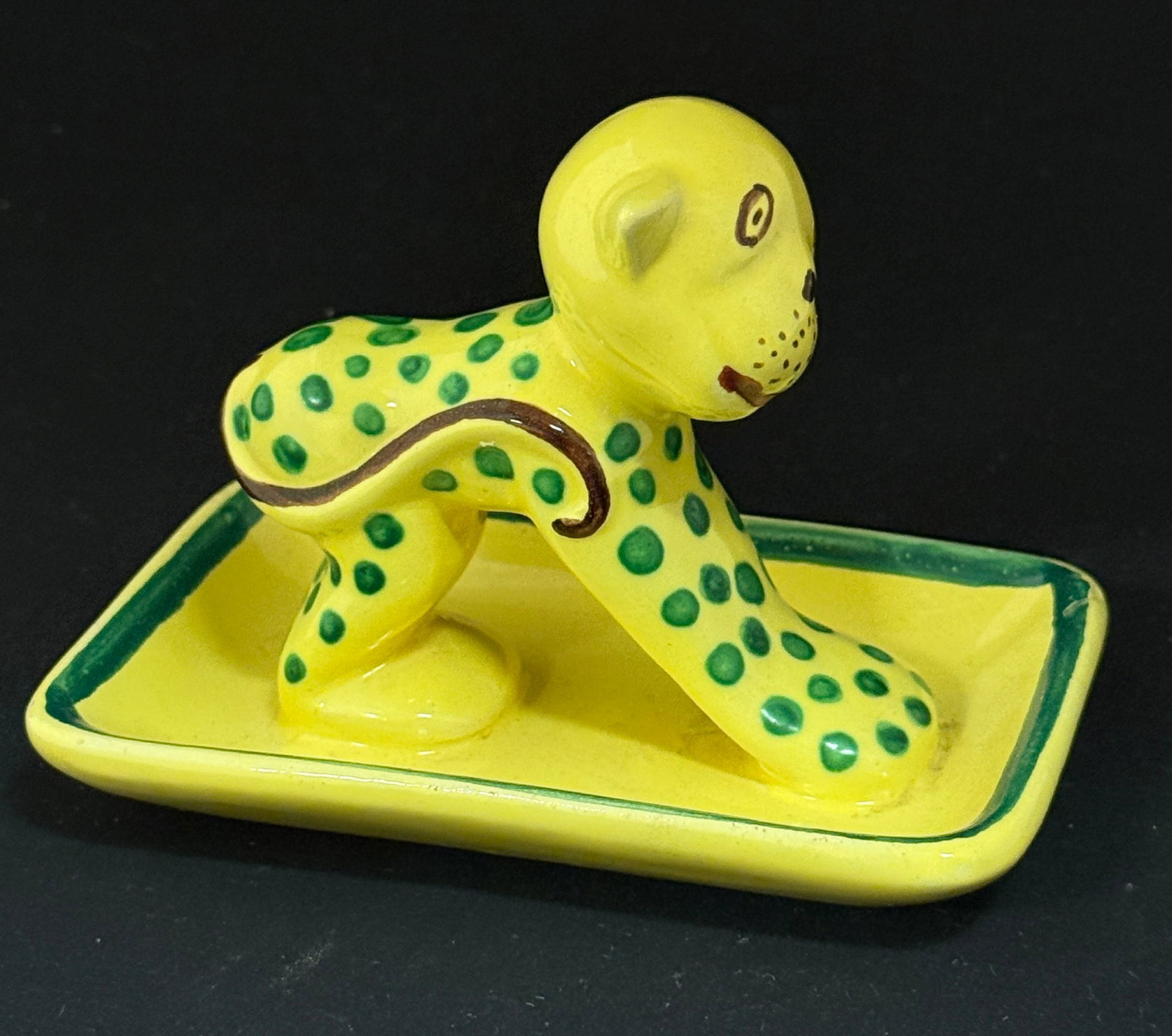HB Quimper Polka Dot Monkey: HB Quimper polka dot monkey yellow, green, dark rose; ht. 3 1/2" circa 1920-1950. CONDITION: Quimper has propensity to have minor chips, glaze loss/wear and crazing. Jaremos attempts to call any