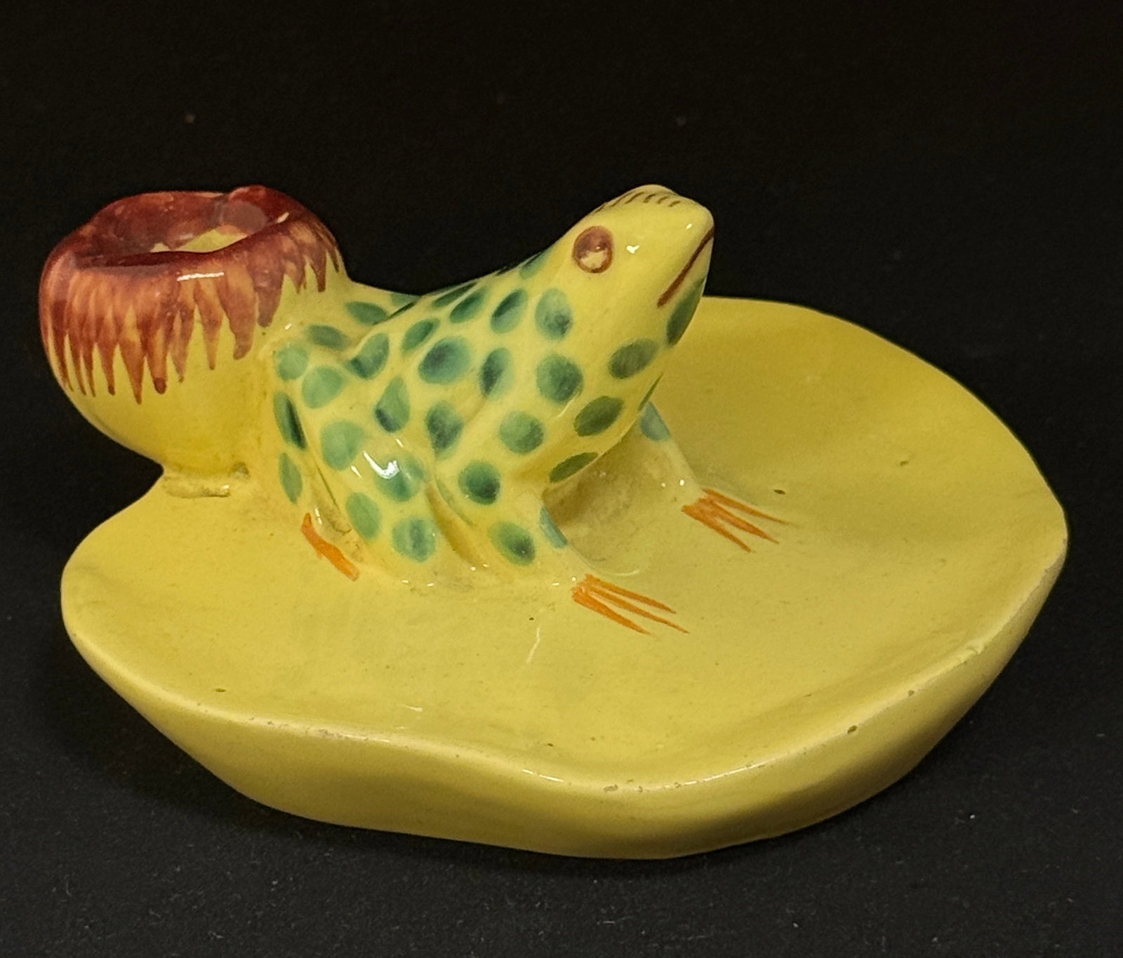 HB Quimper Polka Dot Frog: HB Quimper polka dot frog yellow, green and rose; ht. 2 1/2" circa 1920-1950. CONDITION: Quimper has propensity to have minor chips, glaze loss/wear and crazing. Jaremos attempts to call any material