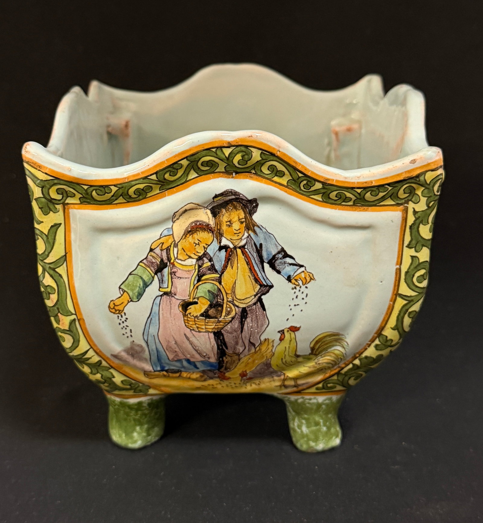 Porquier Beau Footed Planter: Porquier Beau square footed planter having 4 scenes with children, a pig, and chickens, d?cor riche borders and sponged feet "Environs de Quimper"; ht. 5 1/4" circa 1874-1904. CONDITION: missing top.