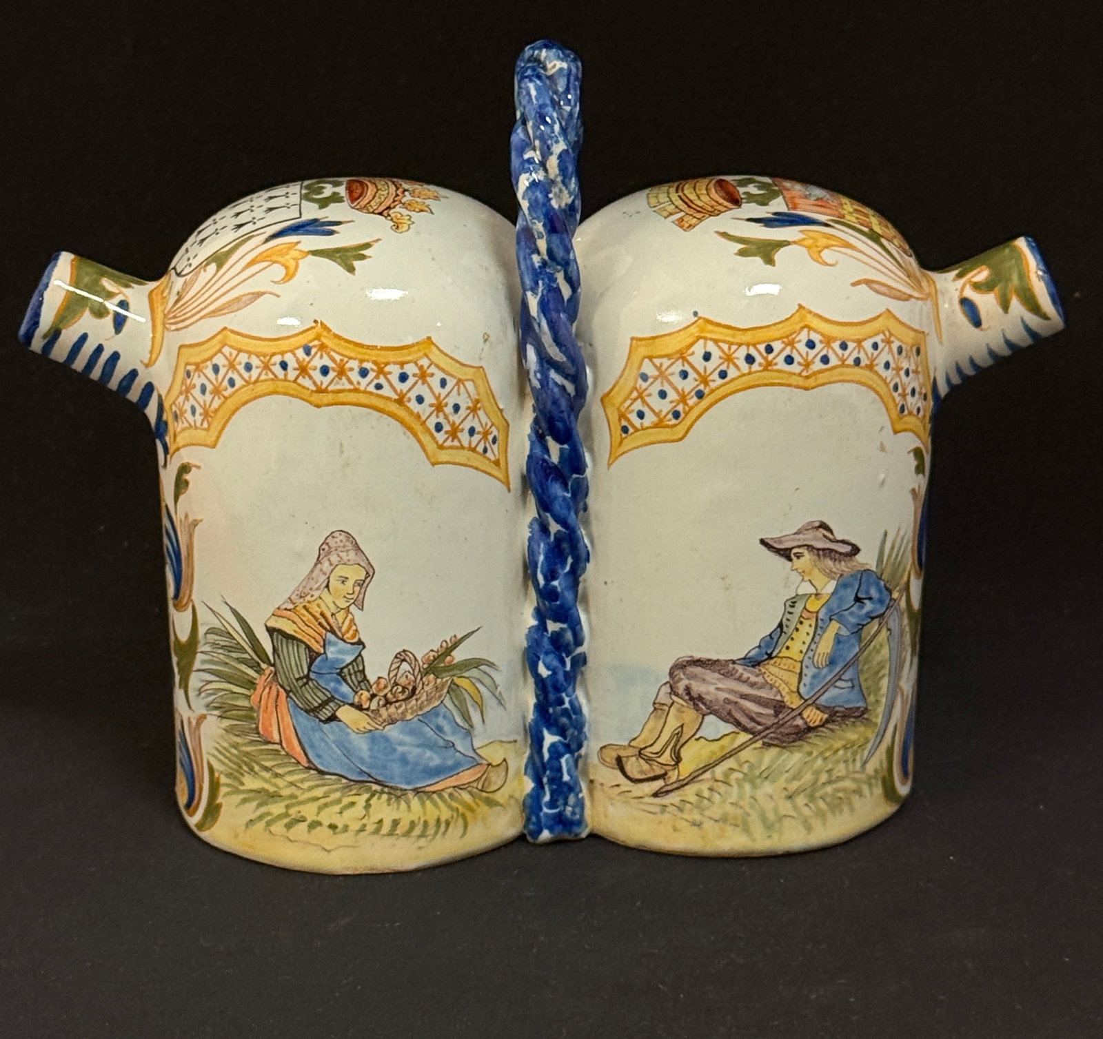 Porquier Beau Oil and Vinegar: Porquier Beau oil and vinegar with twisted handle, Blasons of Brittany and St. Malo. LITERATURE: one scene depicted Tome II page 430 Planche No 45 Plugoffan/Lesneven opposing scene of Breton being ser