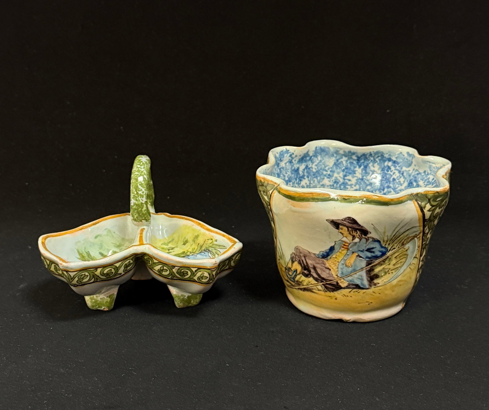 2 Porquier Beau Items: 2 Porquier Beau items with green decor riche borders 1) a double salt with a Breton couple 2) small pot with a reaper at rest. LITERATURE: Tome II page 430 Planche No 45 Plugoffan; tallest 3 1/2"