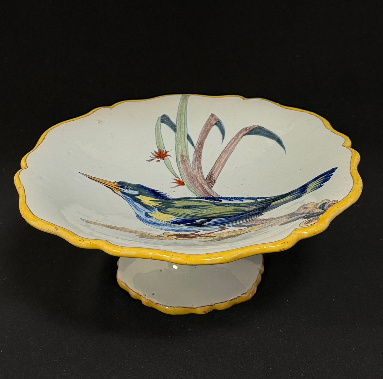 Porquier Beau Compote: Porquier Beau compote with a Merleblue bird. LITERATURE: Tome II page 292 D?cor No 13; 9 1/4" diameter circa 1880. CONDITION: Quimper has propensity to have minor chips, glaze loss/wear and crazing.