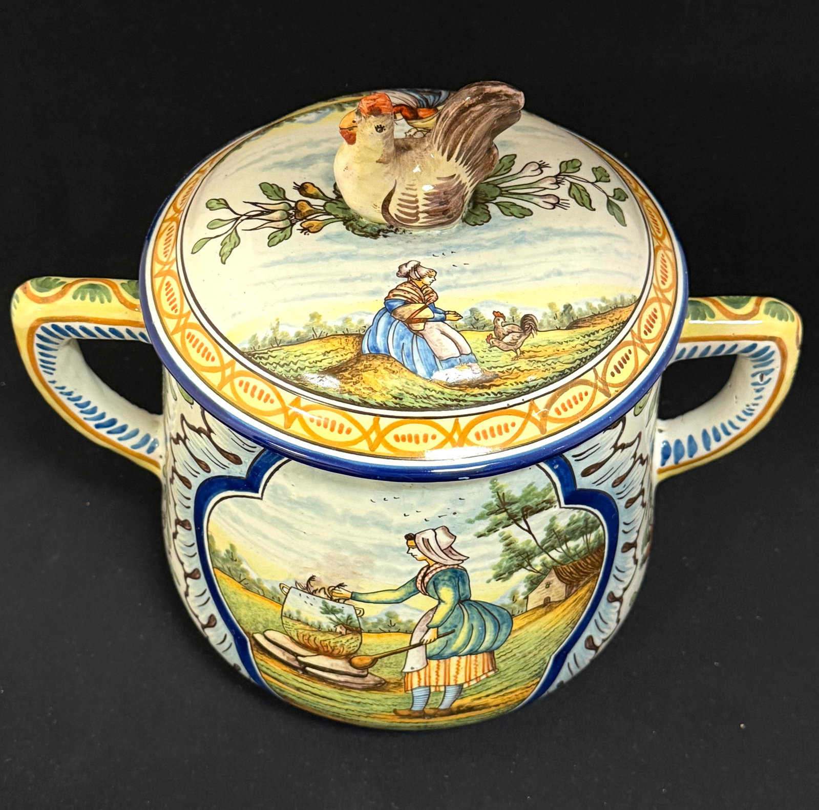 Antonine Montagnon-Nevers Pot: Antonine Montagnon-Nevers large lidded pot with hen motif and scenes of a woman with hens on two sides, lid has hen finial; ht 10 1/4" circa 1889-1899. CONDITION: Quimper has propensity to have minor