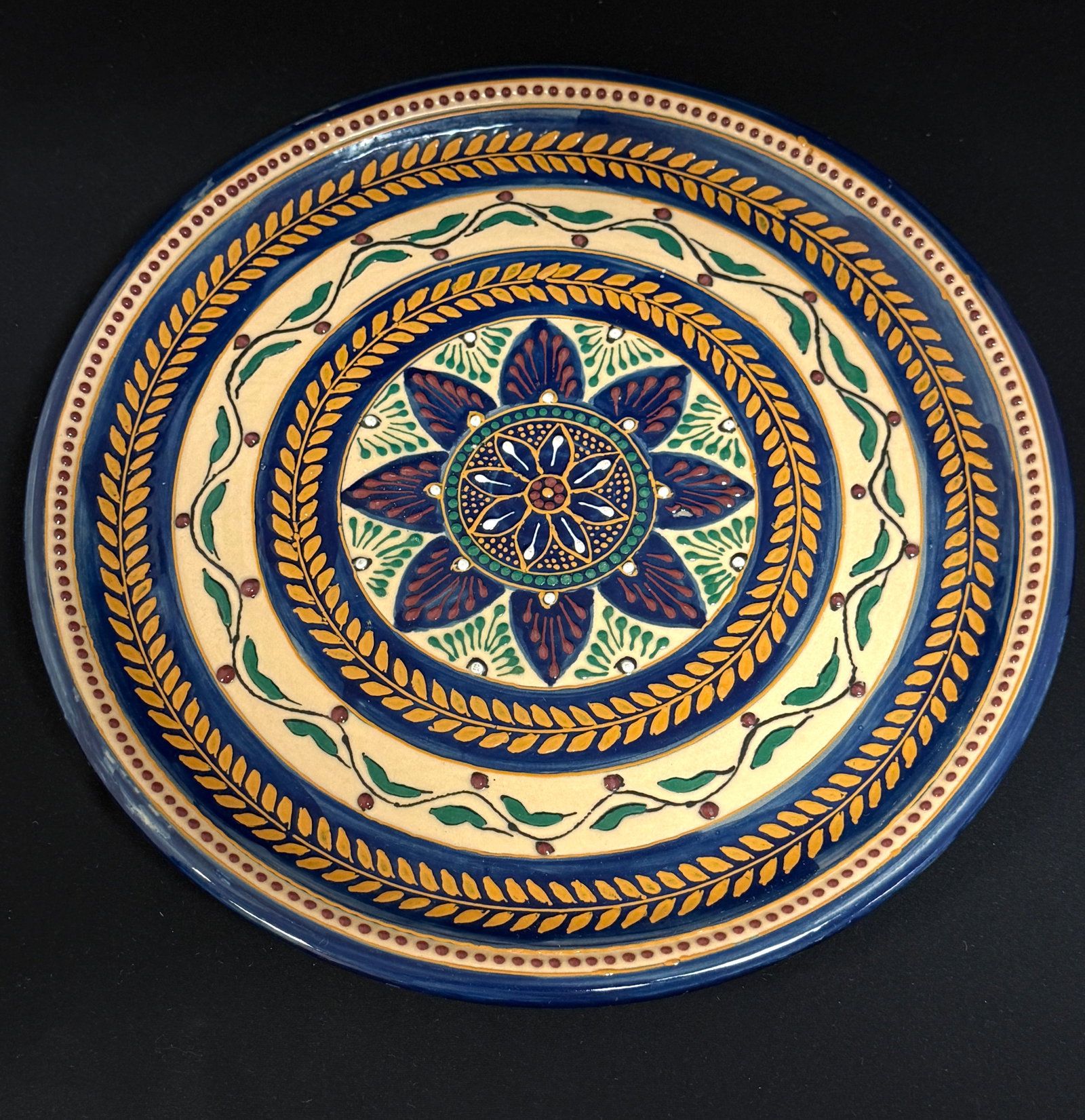 HB Quimper Round Broderie Tray: HB Quimper round Broderie tray with raised motif resembling hand stitched embroidery on Breton clothing; diameter 12 !/2" circa 1930-1950. CONDITION: Quimper has propensity to have minor chips, glaze