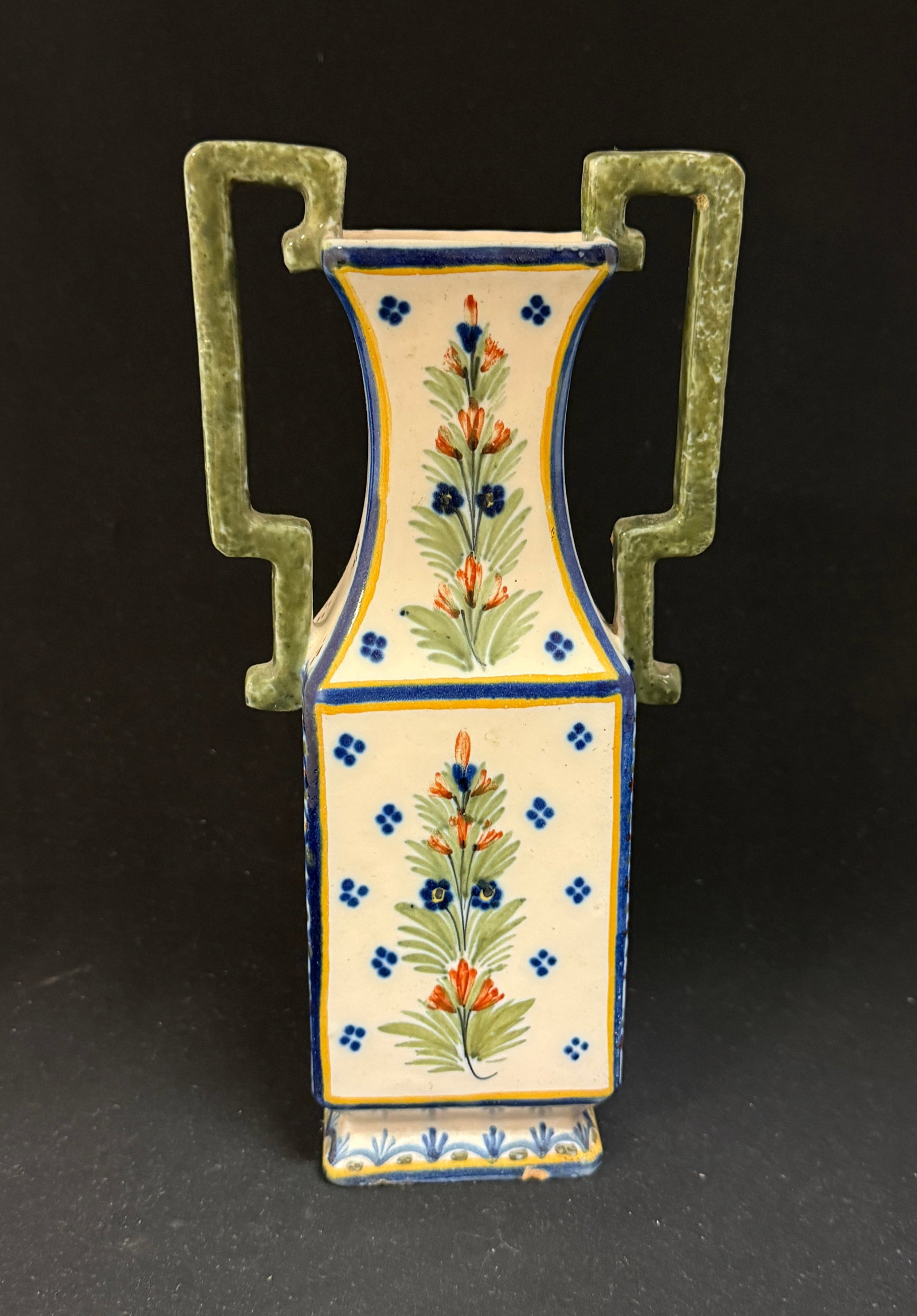 HR Quimper Amphora Vase: HR Quimper rectangular amphora vase with sponged angular handles, crosshatch side panels and generously decorated with 4 dot motif with floral and foliate sprays; ht 10 1/2" circa 1904-1922.