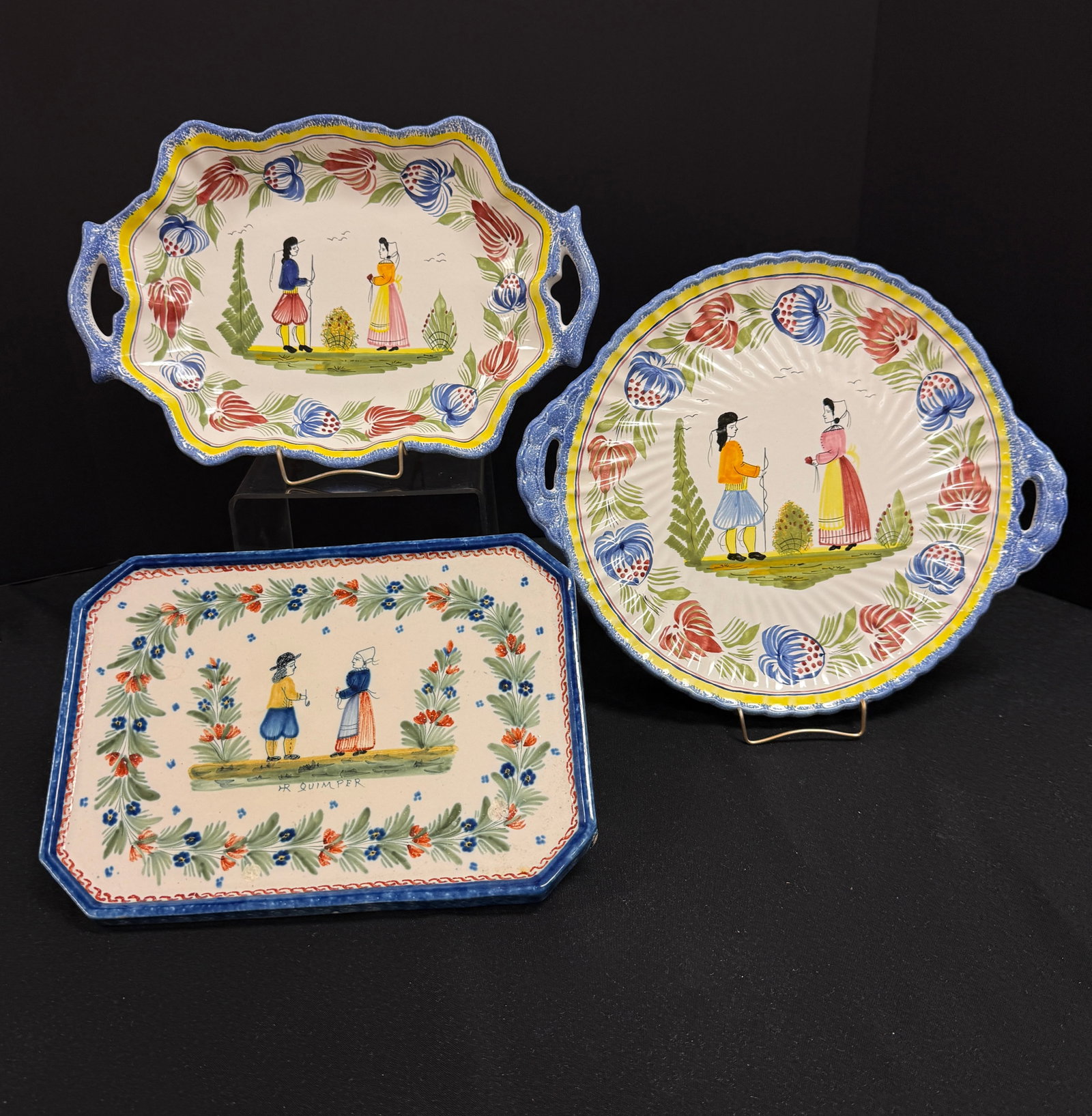 3 Quimper Serving Pieces: 3 Quimper serving pieces including an HR Quimper 8 sided rectangular tray with sponged rim, a Breton couple surrounded by 4 dot motif and a la touch? floral and foliate sprays together with a