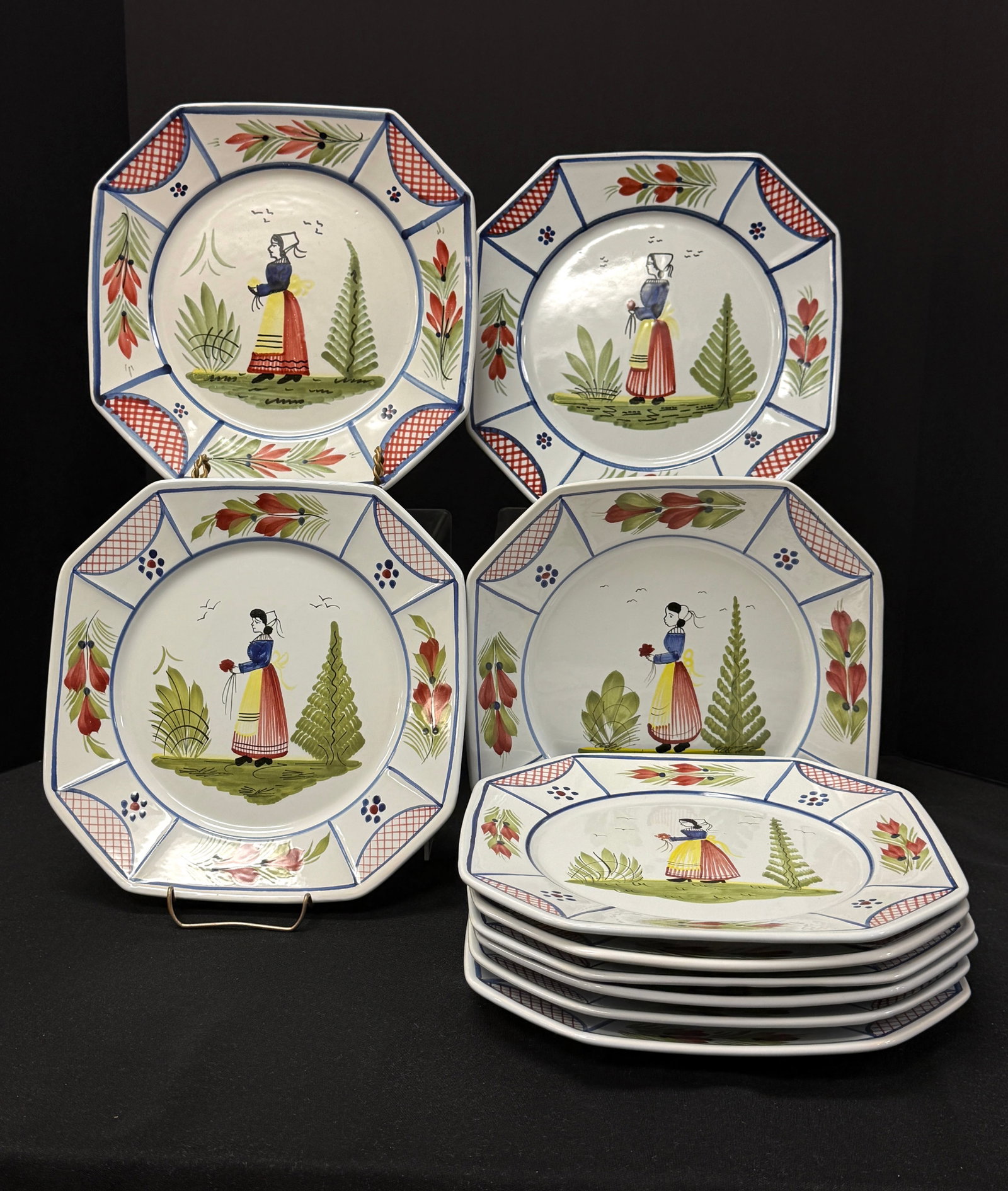 Grouping of HB HenRiot Quimper: Grouping of HB HenRiot Quimper Mistral including 10 dinner plates and 12 salad/dessert plates; plate diameter 10" circa 1984-2000. CONDITION: Quimper has propensity to have minor chips, glaze