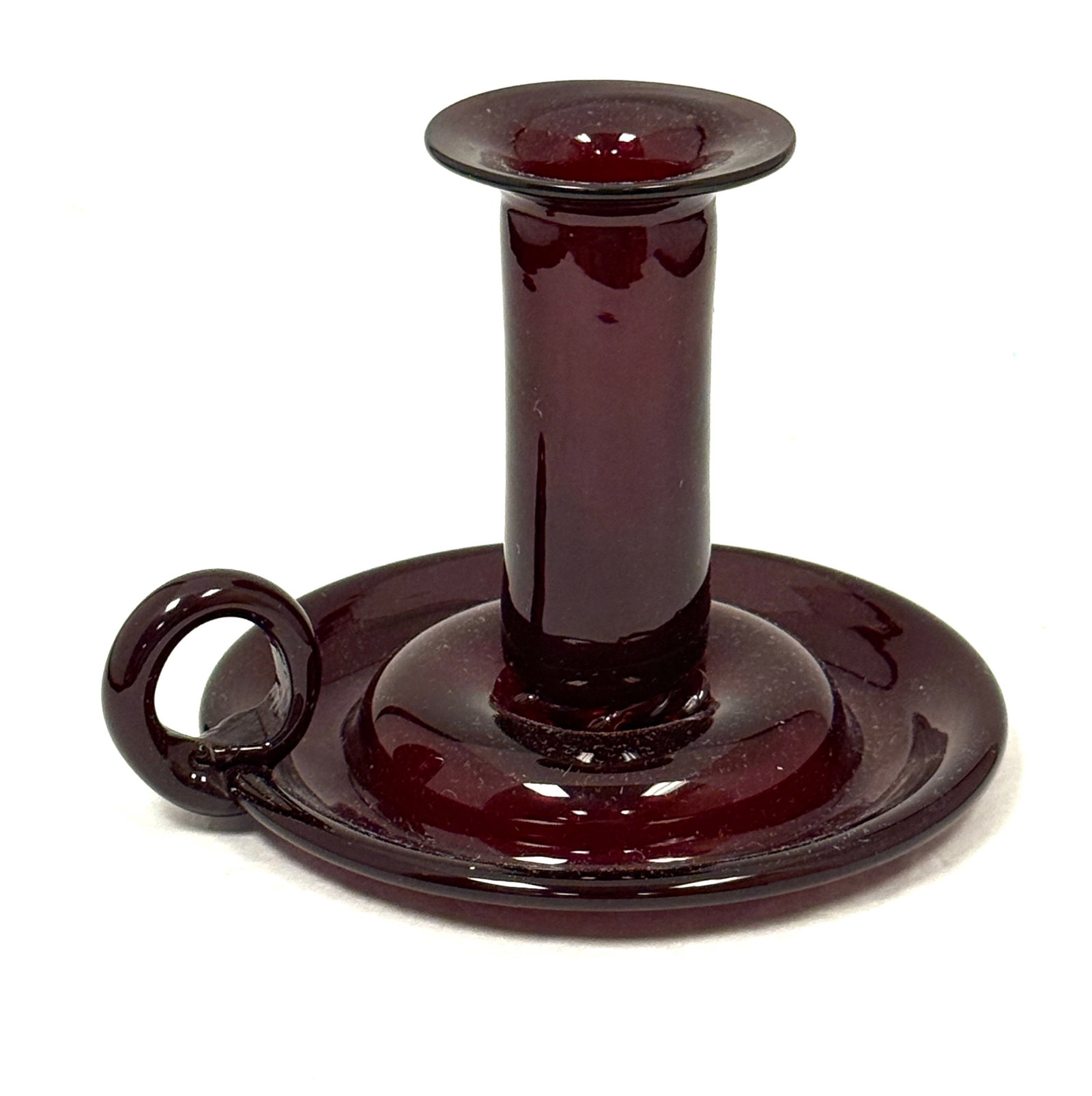 Blenko Selenium Red Candlestick: Blenko Selenium red evening chamber candlestick, 4" ht. CONDITION: no chips, cracks, repairs or material defects found, Jaremos attempts to call any material flaw that affects the price, but minor scr