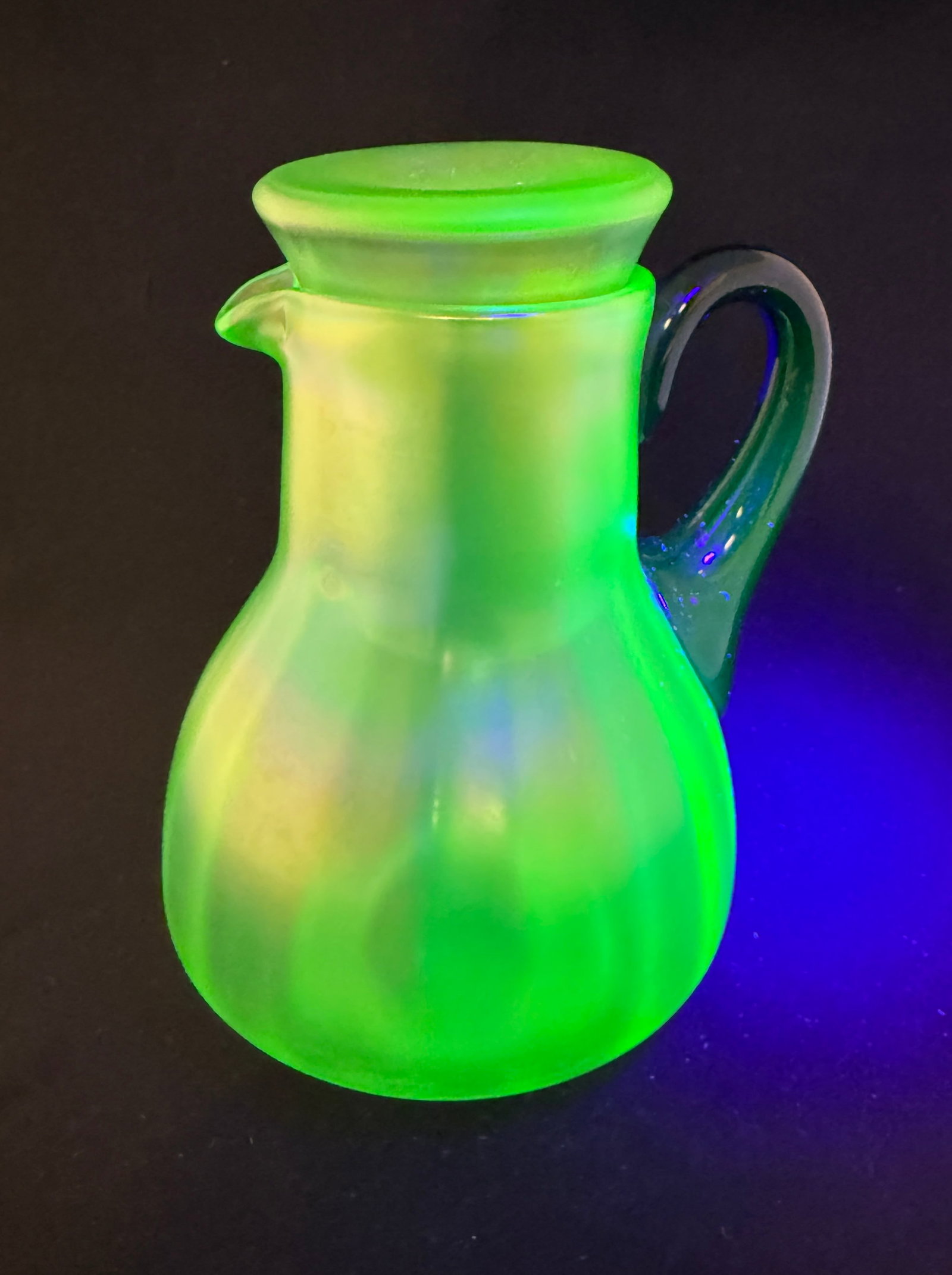 Fenton Vaseline Tumble Up: Fenton "Florentine" Vaseline pitcher with blue handle and matching tumble up glass 8" ht. CONDITION: no chips, cracks, repairs or material defects found, Jaremos attempts to call any material flaw tha