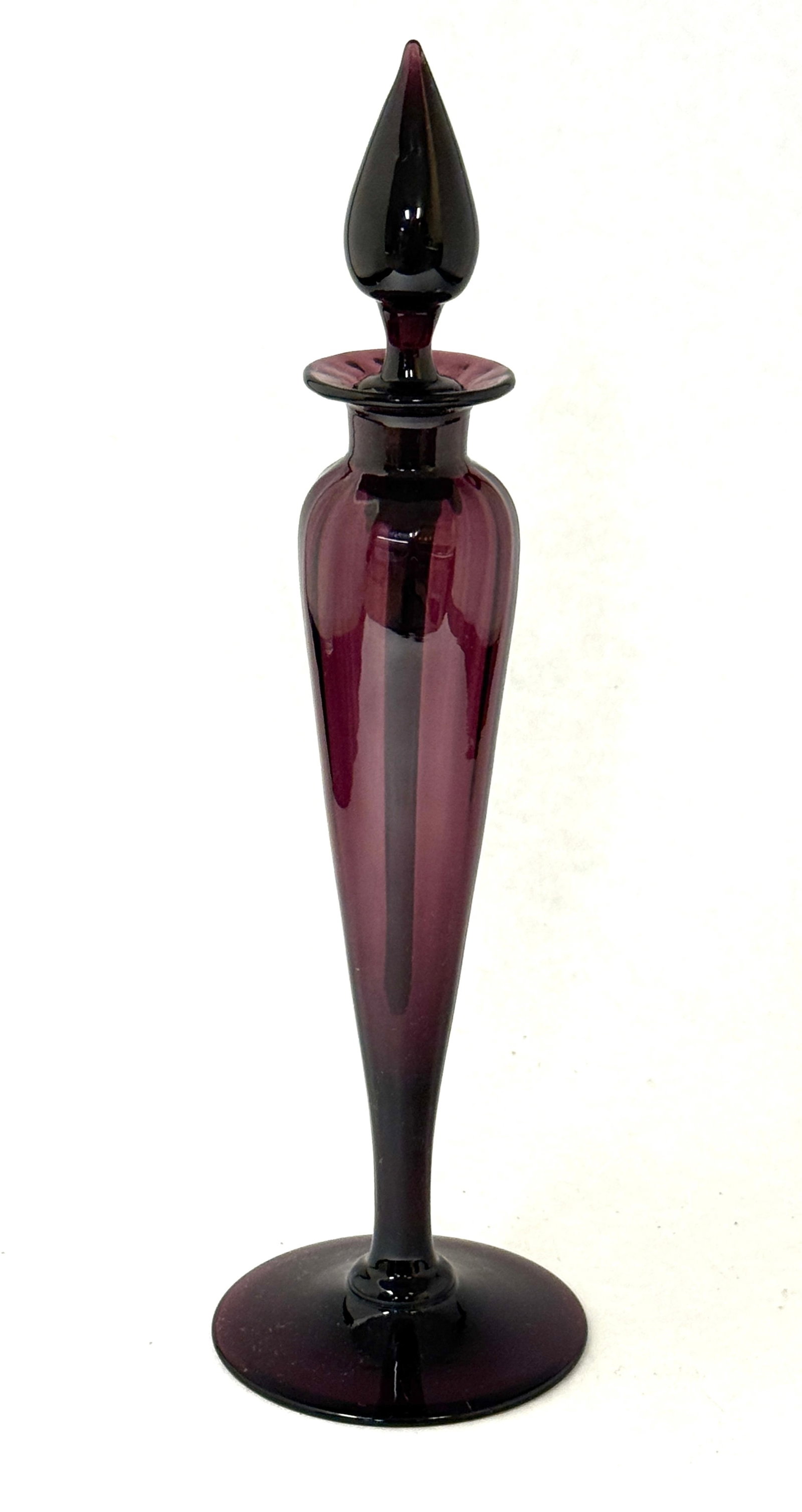 Steuben Amethyst Perfume: Large Steuben Amethyst perfume bottle signed with a Fleur de Lis, shape 1414, 10" ht. CONDITION: no chips, cracks, repairs, or material defects found, Jaremos attempts to call any material flaw that