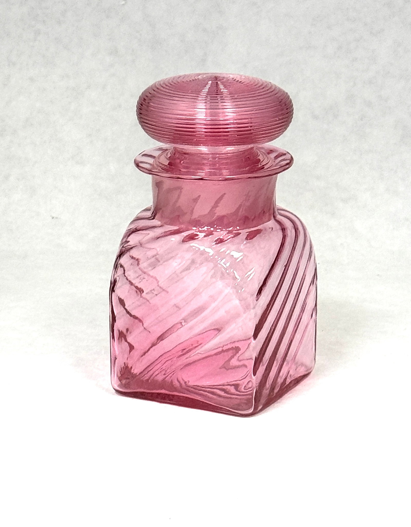 Steuben Gold Ruby Bottle: Steuben Gold Ruby bath bottle with overall threading, signed with a Fleur-de-Lis, 5 1/4" ht. CONDITION: no chips, cracks, repairs, or material defects found, Jaremos attempts to call any material