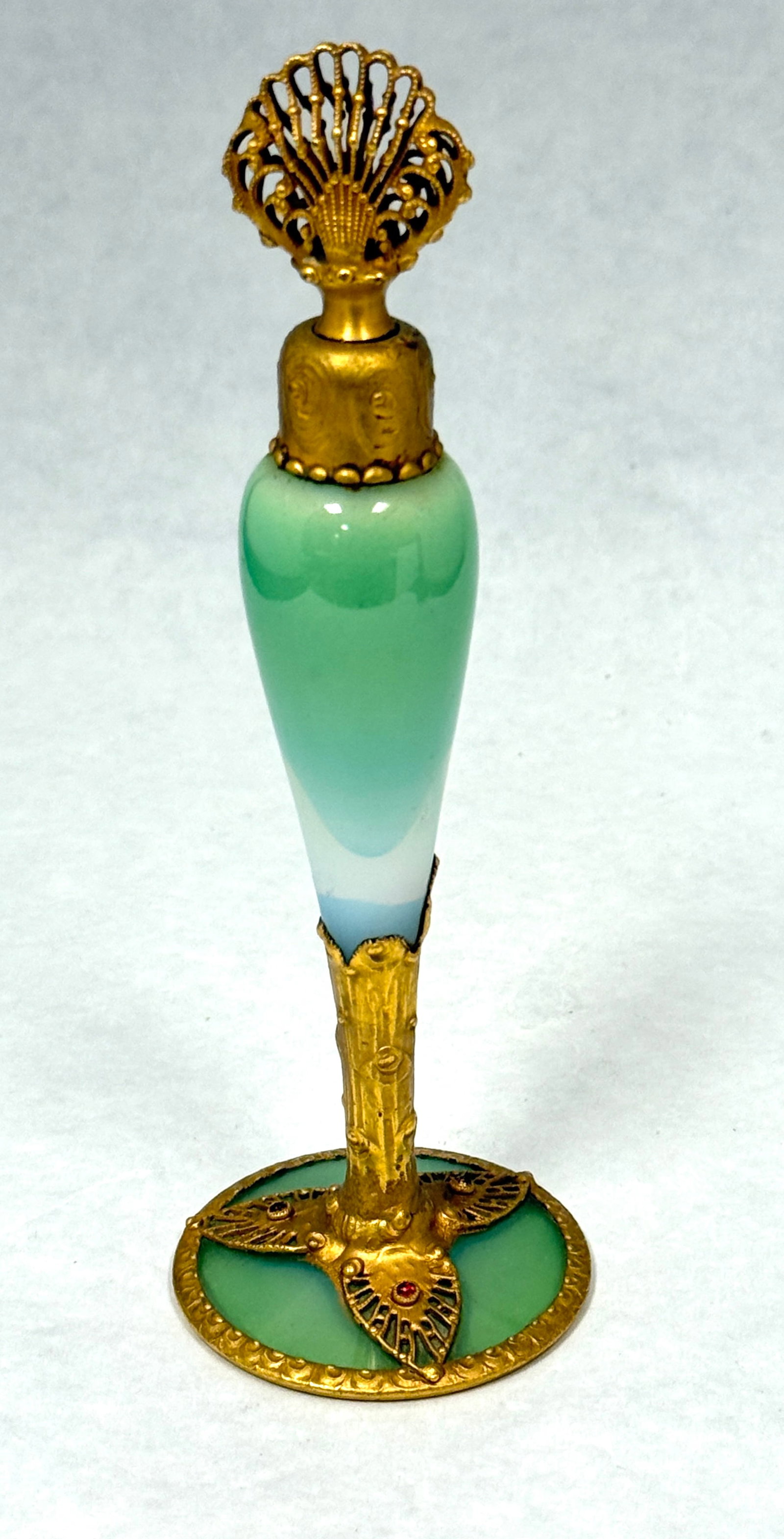 DeVilbiss Imperial Perfume: Devilbiss blue shading to green Imperial Line perfume with a jeweled foot and a reticulated stopper, signed DeVilbiss, 6 3/4" ht. CONDITION: no chips, cracks, repairs, or material defects found,