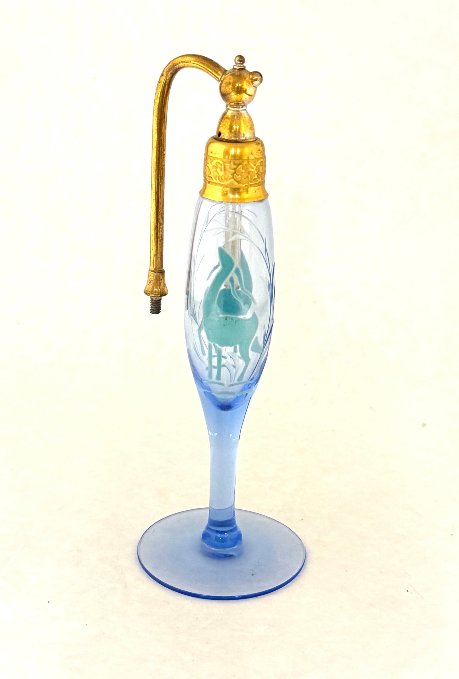 DeVilbiss Gazelle Blue Perfume: DeVilbiss translucent blue perfume decorated with two gazelles, 6 3/4" ht. CONDITION: no chips, cracks, repairs, or material defects found, Jaremos attempts to call any material flaw that affects the