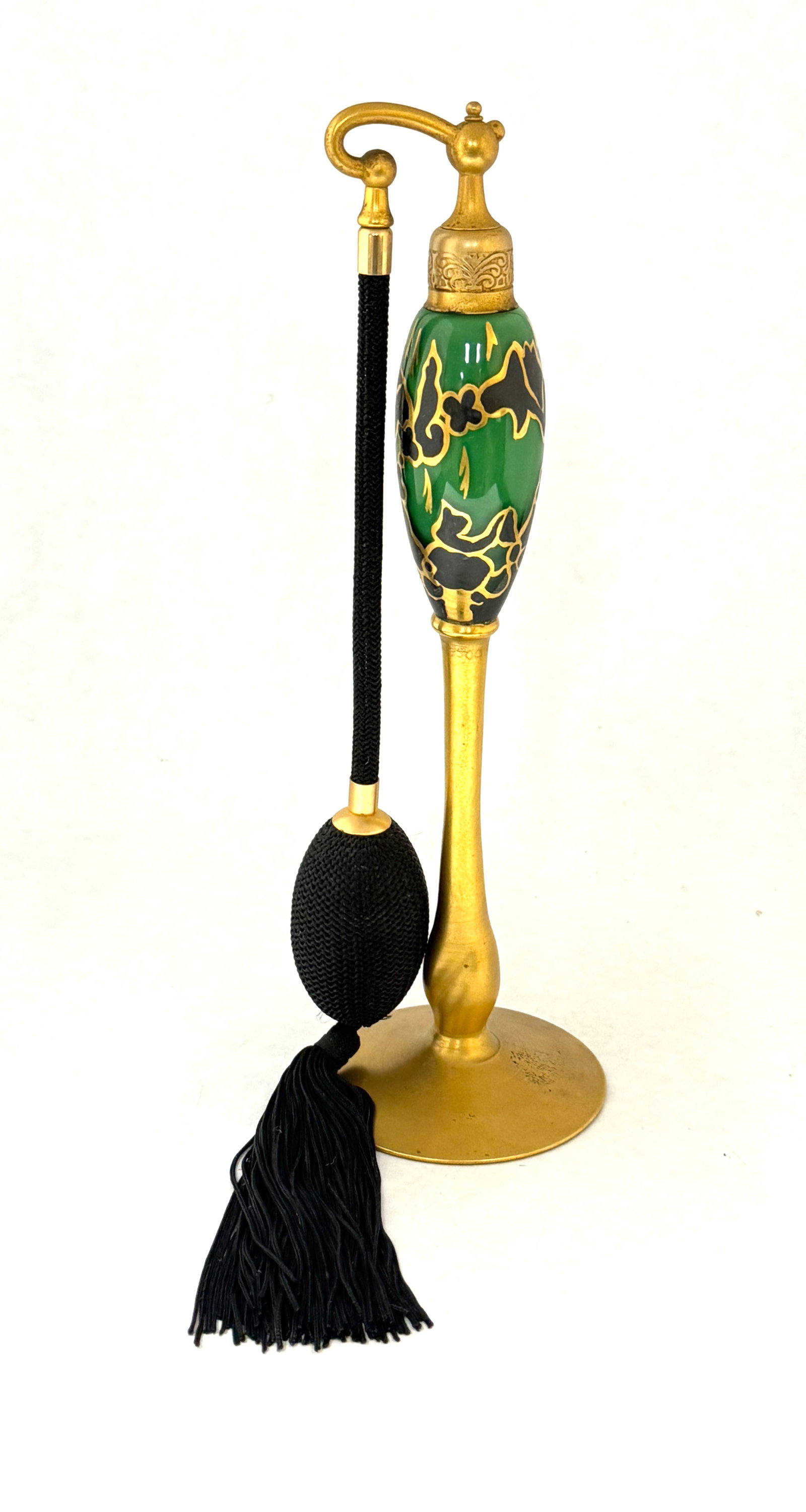 DeVilbiss Green Perfume: DeVilbiss Green perfume atomizer with gold outline black splotches, signed Devilbiss 9 1/2" ht. CONDITION: no chips, cracks, repairs, or material defects found, Jaremos attempts to call any material
