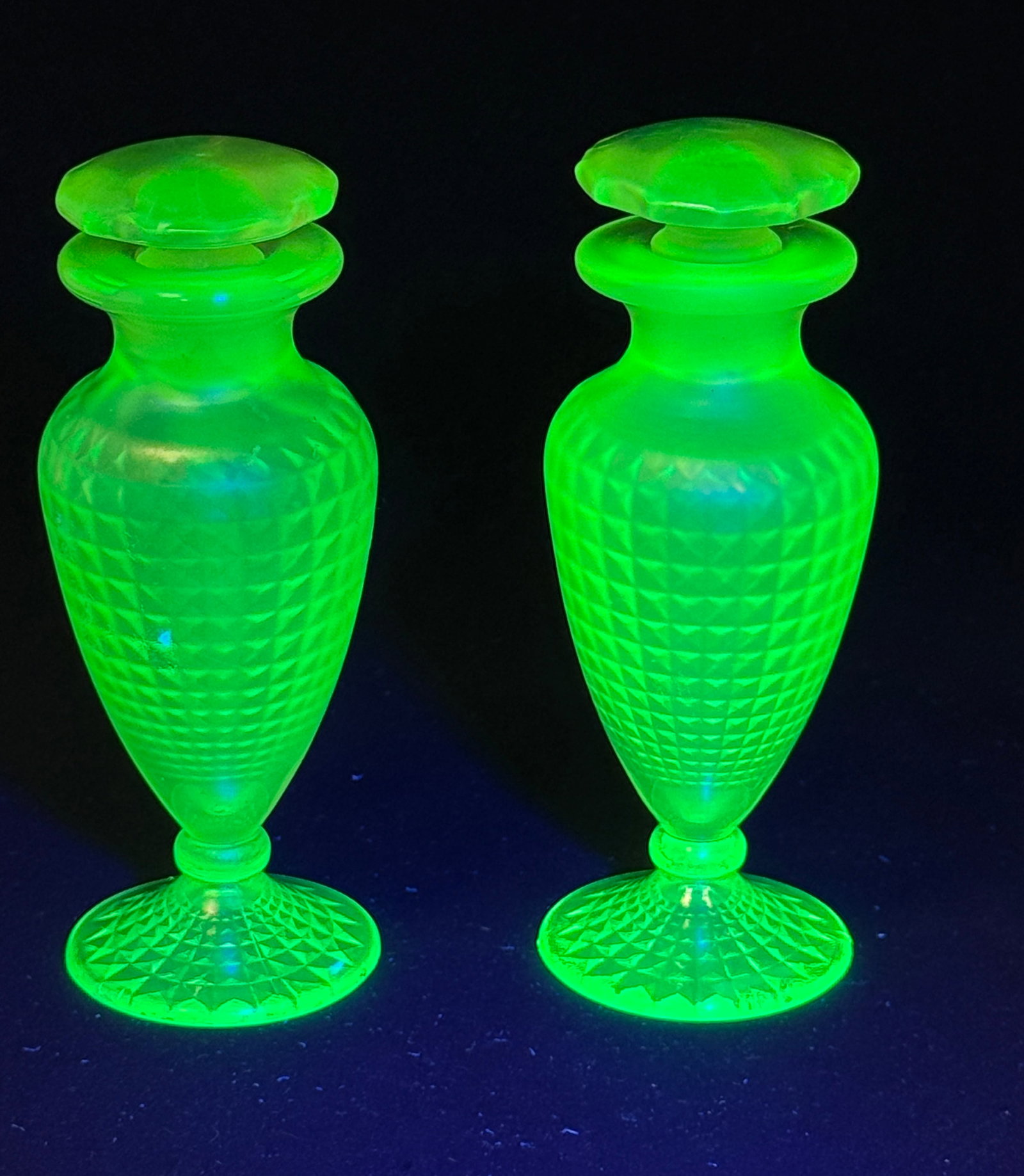 Two Fenton Vaseline Perfumes: Two Fenton uranium vaseline honeycomb perfumes, 5" ht. CONDITION: no chips, cracks, repairs, or material defects found, Jaremos attempts to call any material flaw that affects the price, but minor