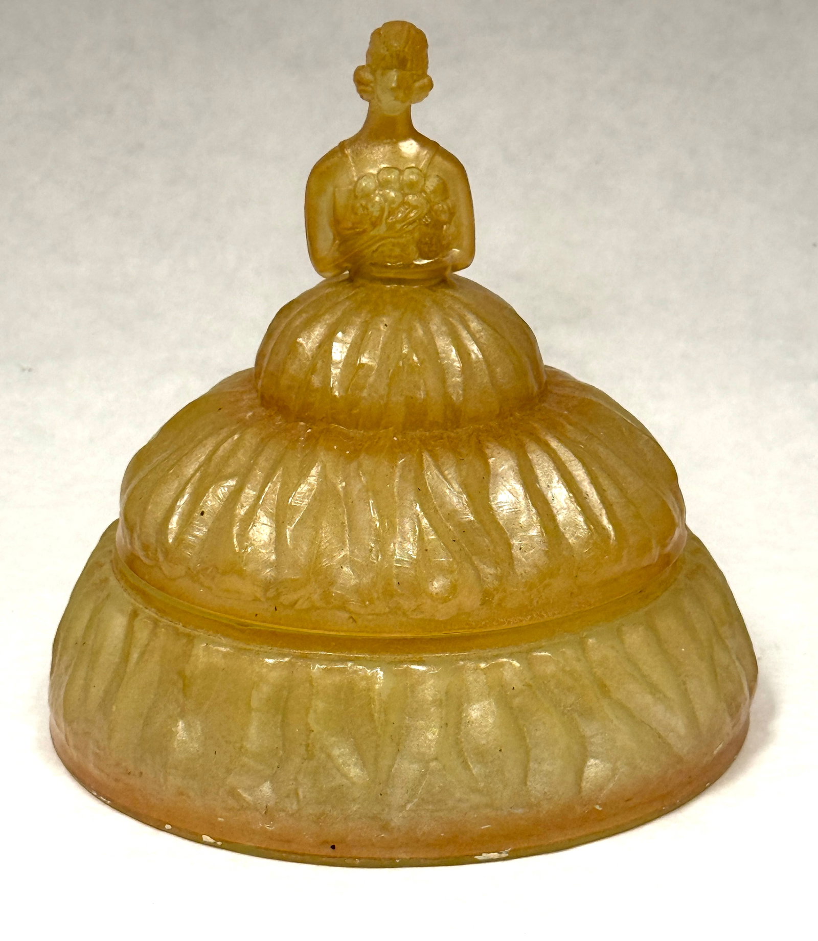 Lillian IV Covered Bath Box: Lillian IV drapery covered box with a female finial, 6 1/2" ht. LITERATURE: "Bedroom & Bathroom Glassware" by Whitmyer page 31. CONDITION: no chips, cracks, repairs, or material defects found,