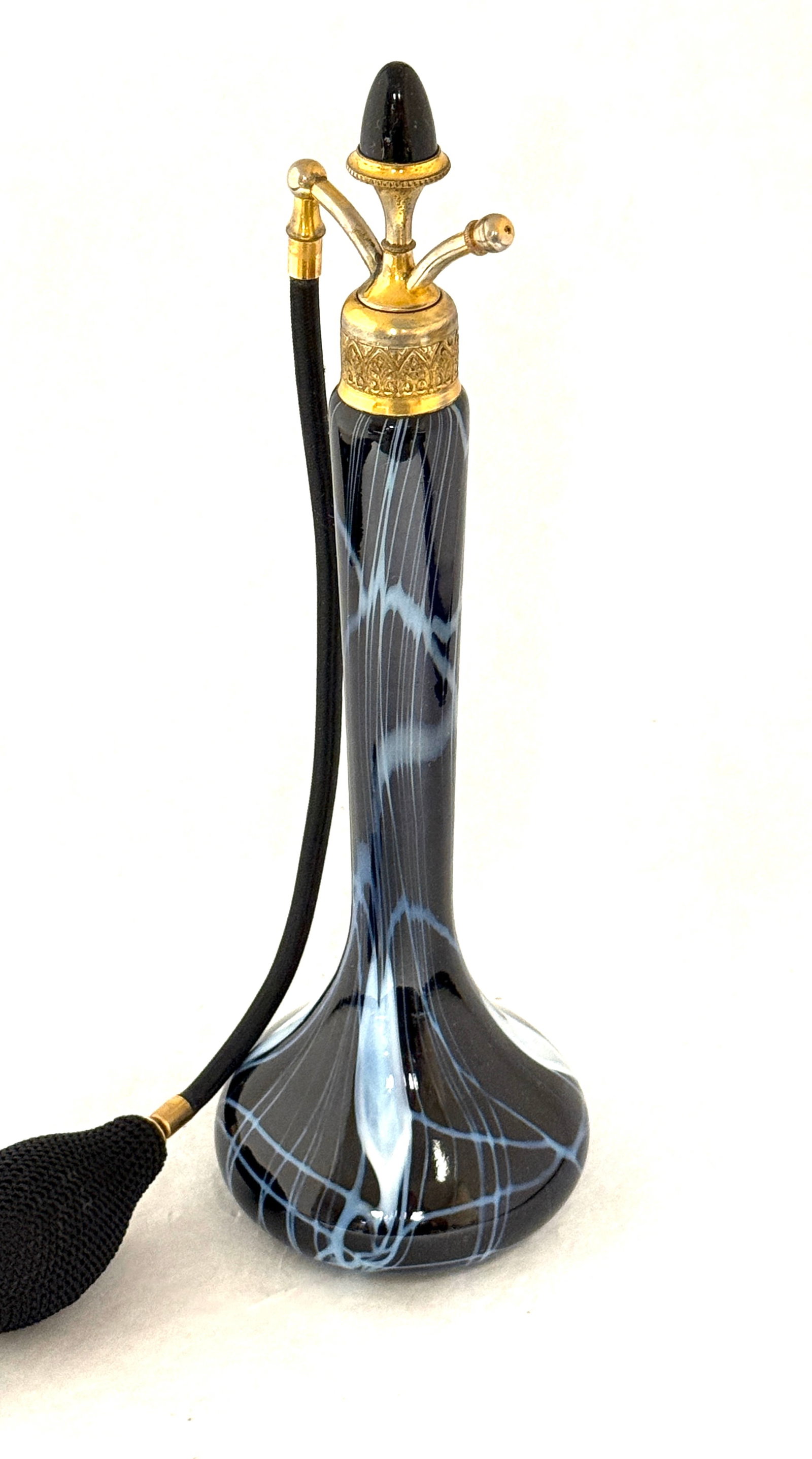 Imperial Blue Free Hand Perfume: Imperial blue free hand perfume atomizer decorated with white heart and vines and adorned with a jeweled stopper, signed Devilbiss, 10 1/4" ht. CONDITION: no chips, cracks, repairs, or material defect