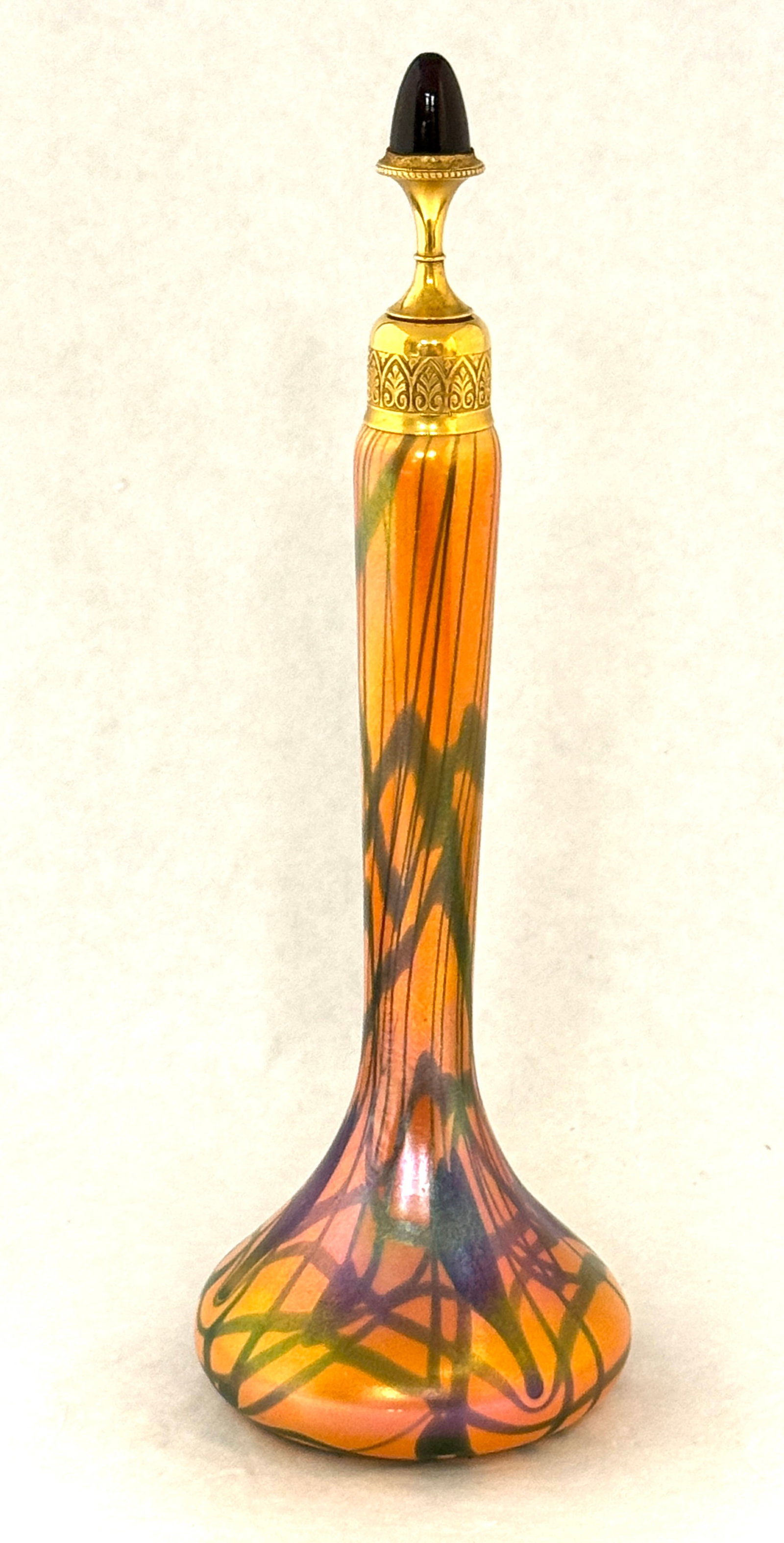 Imperial Orange Free Hand Bottle: Imperial orange free hand perfume decorated with blue heart and vines, 10 1/4" ht. CONDITION: no chips, cracks, repairs, or material defects found, Jaremos attempts to call any material flaw that affe