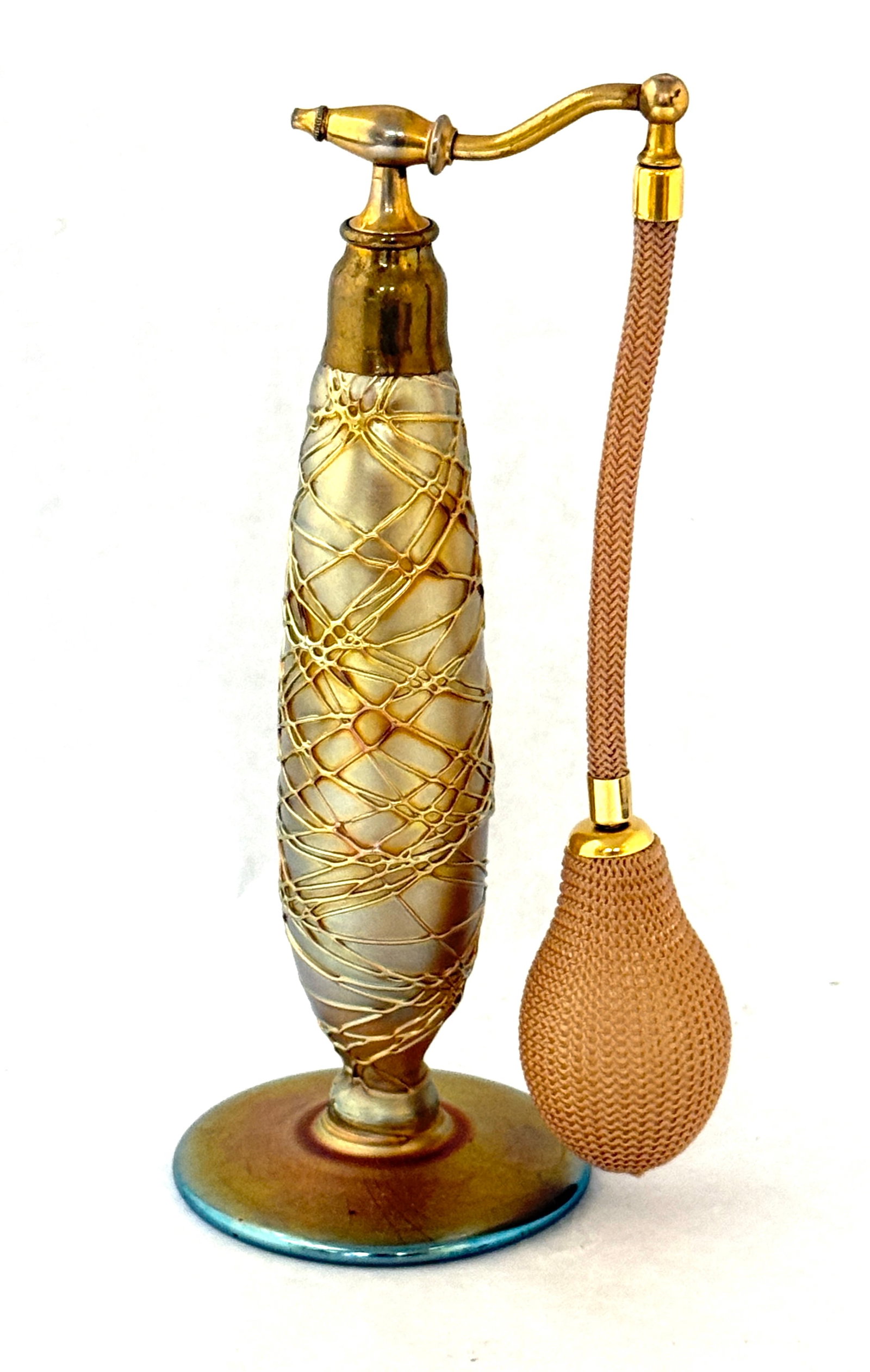 Durand Gold Threaded Perfume: Durand iridescent gold perfume with overall threading, 7 1/2" ht. CONDITION: no chips, cracks, repairs, or material defects found, Jaremos attempts to call any material flaw that affects the price,
