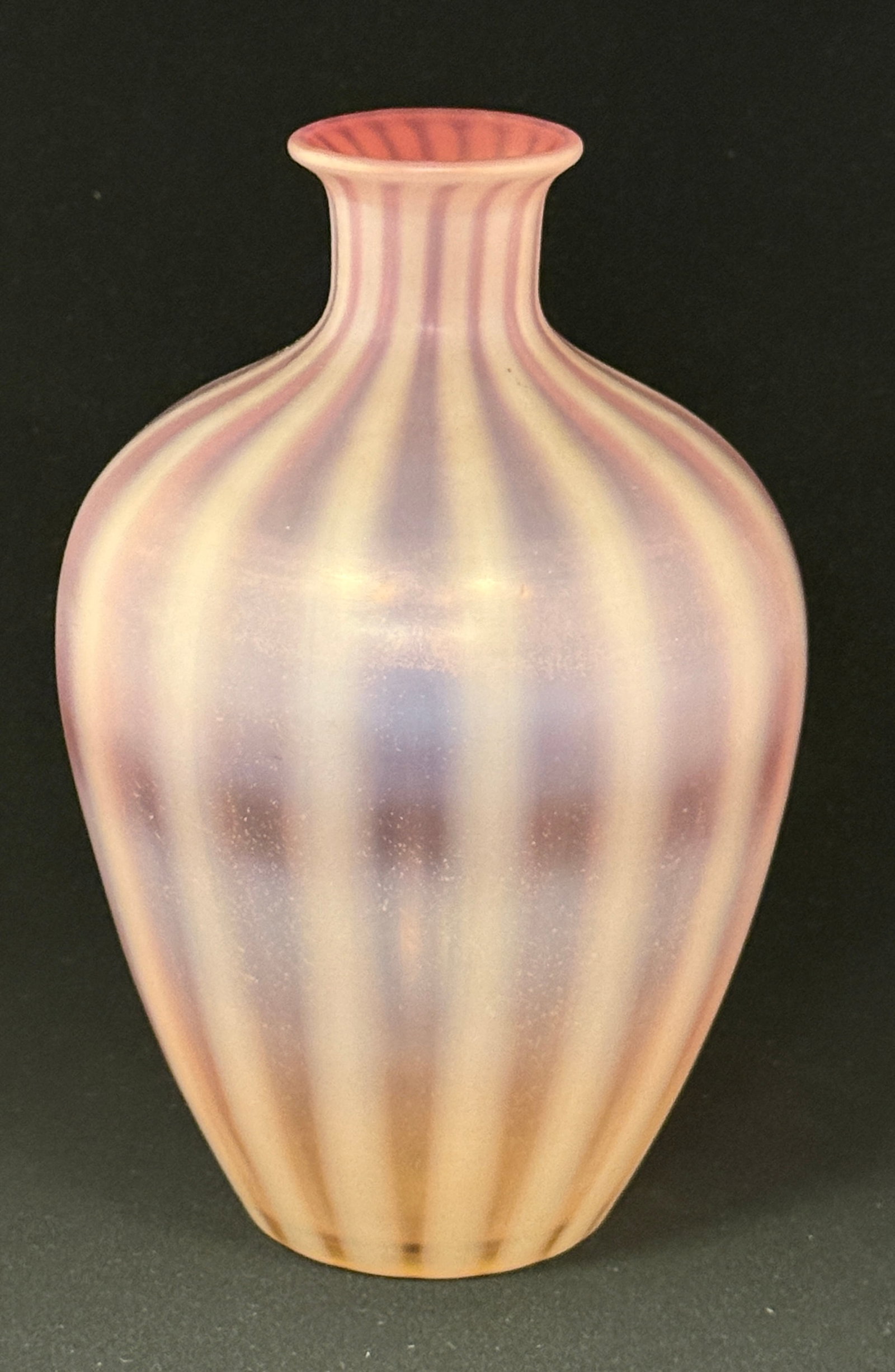 Steuben Oriental Poppy Vase: Steuben Oriental Poppy vase in pink pastel, 8" ht. CONDITION: no chips, cracks, repairs or material defects found, Jaremos attempts to call any material flaw that affects the price, but minor scratche