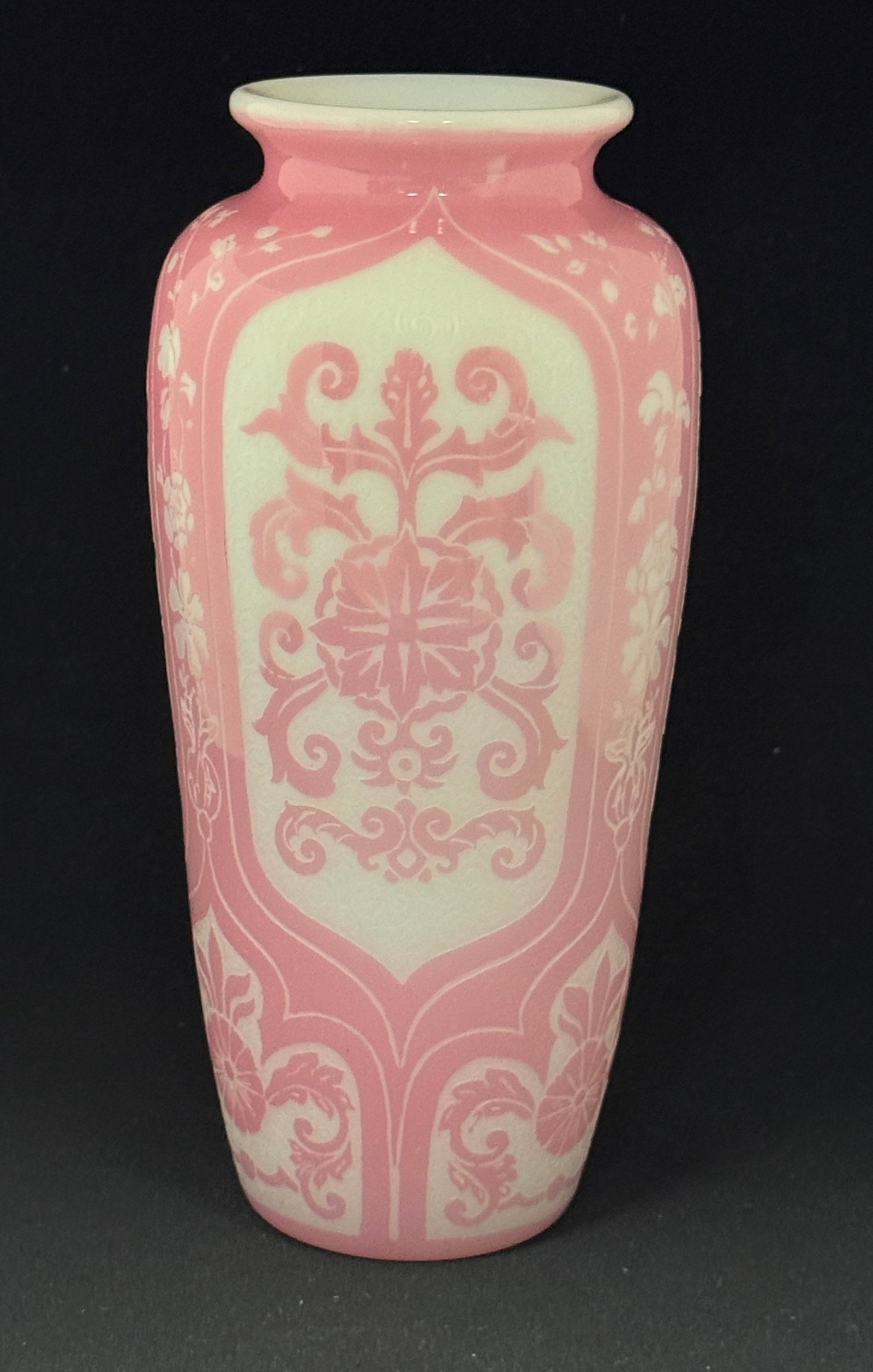 Steuben ACB Glass Vase: Steuben Rosaline over calcite acid cut back vase decorated with Oriental panels of flowers over a double acid cut back scrolling background, drilled 10" ht. CONDITION: no chips, cracks, repairs or