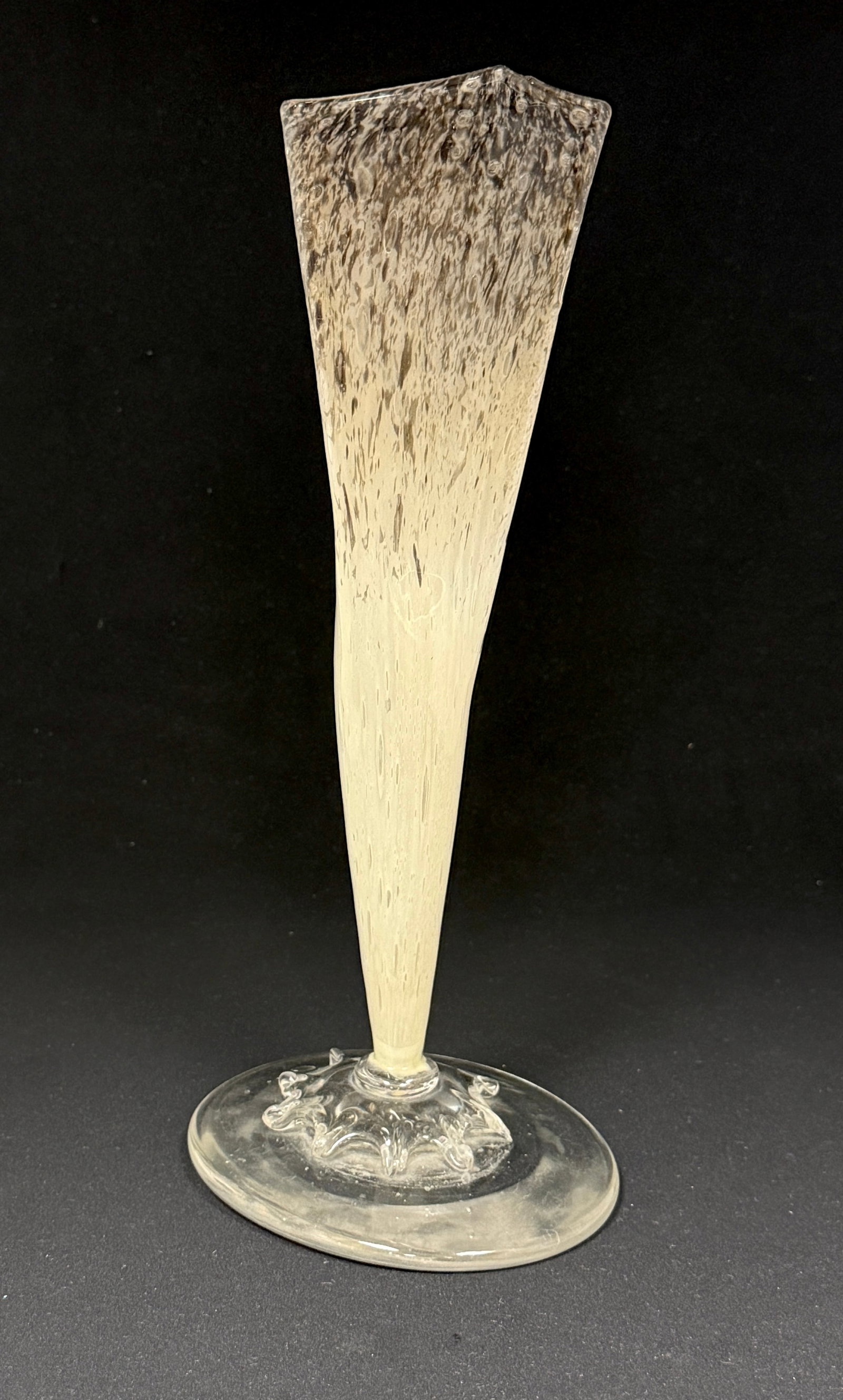 Steuben Cluthra Deco Vase: Steuben Black Cluthra Deco trumpet with a triangular rim, signed with a Fleur-de-Lis, 12" ht. CONDITION: no chips, cracks, repairs or material defects found, Jaremos attempts to call any material