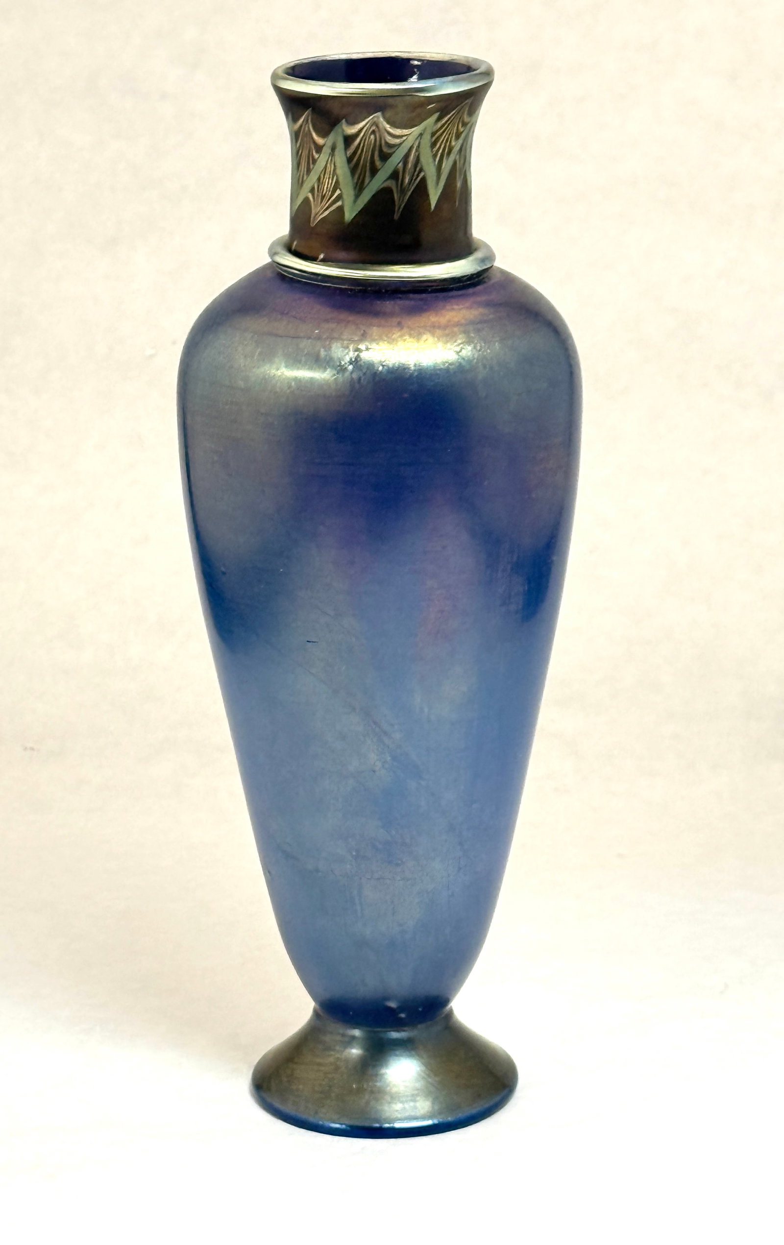 Tiffany Tel El Amarna Vase: Tiffany blue Favrile Tel El Amarna vase, signed LCT Tiffany Favrile; ht. 9". CONDITION: no chips, cracks, repairs, or material defects found, Jaremos attempts to call any material flaw that affects th