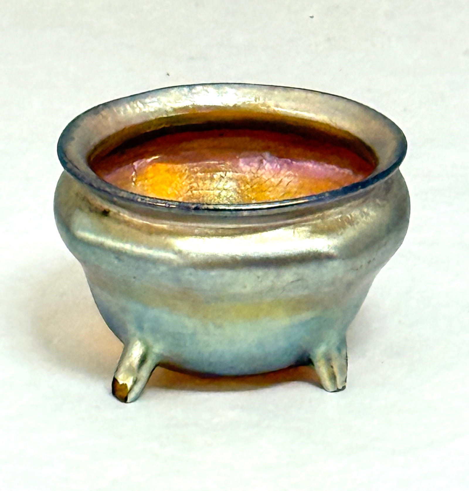 Tiffany Gold Footed Salt: Tiffany gold footed salt, signed LCT numbered and has paper label; ht. 1 1/2". CONDITION: chip on one foot
