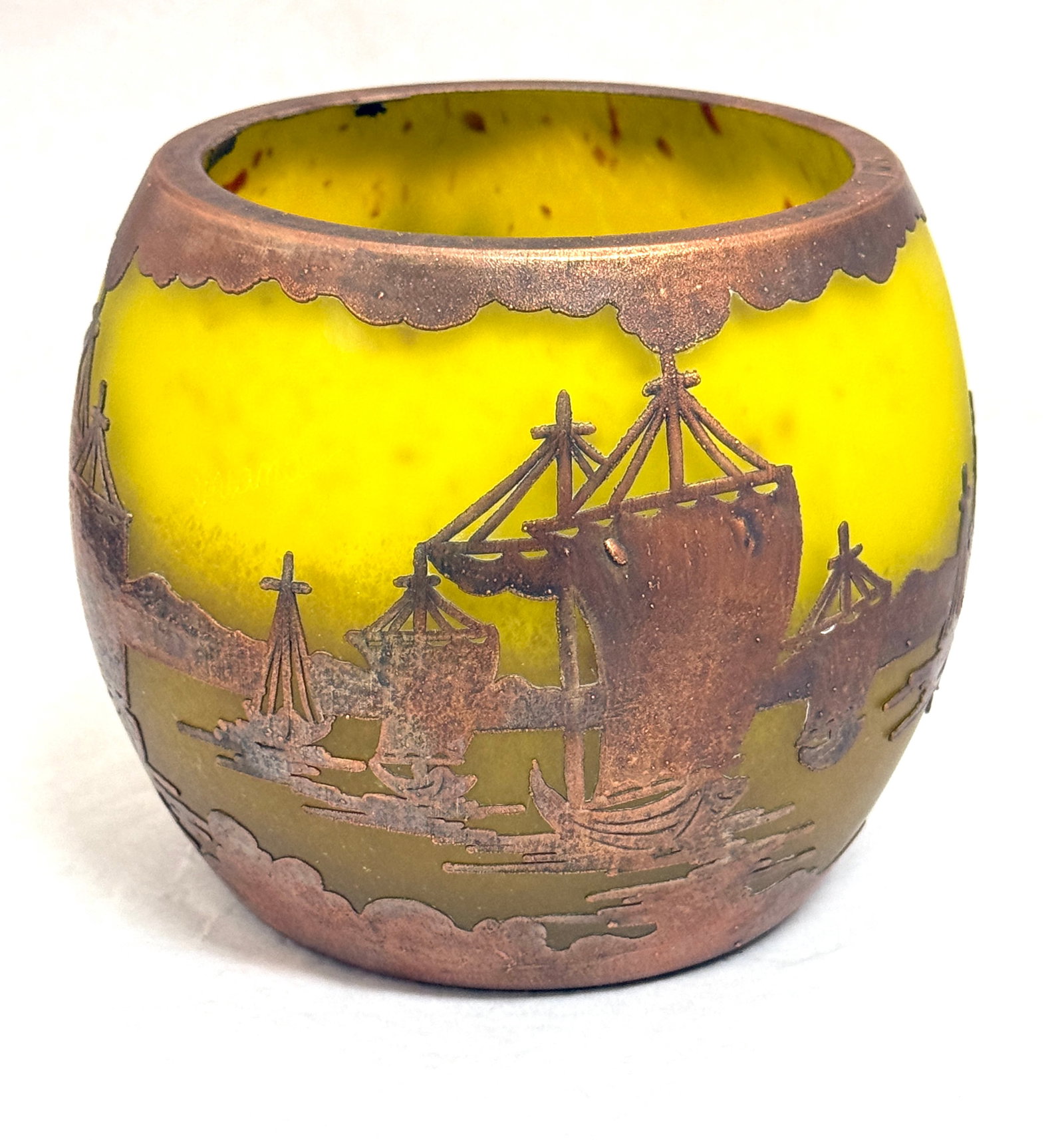 Yellow Bowl with Copper Overlay: Yellow mottled bowl with copper overlay of ships; ht. 5". CONDITION: no chips, cracks, repairs, or material defects found, Jaremos attempts to call any material flaw that affects the price, but minor