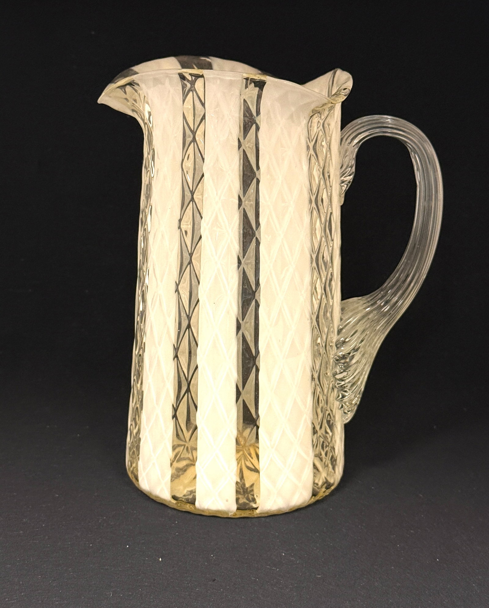 Opalescent Diamond Optic Pitcher: Opalescent white diamond optic wide stripe pitcher; ht. 8 1/4". CONDITION: no chips, cracks, repairs, or material defects found, Jaremos attempts to call any material flaw that affects the price, but 
