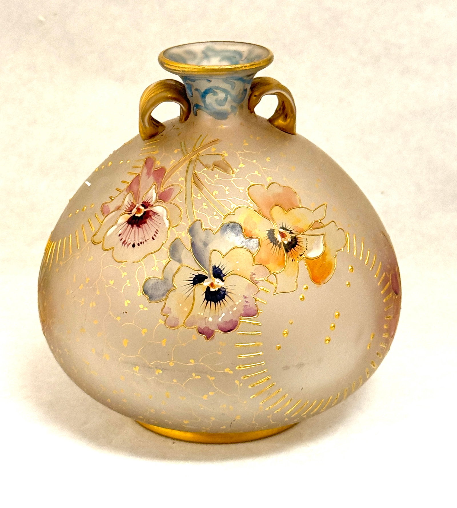 Mt Washington Royal Flemish: Mt. Washington Royal Flemish glass vase, ovoid form in gray glass with two side handles decorated with colorful pansies, marked RF in red, 6" ht. CONDITION: no chips, cracks, repairs or material
