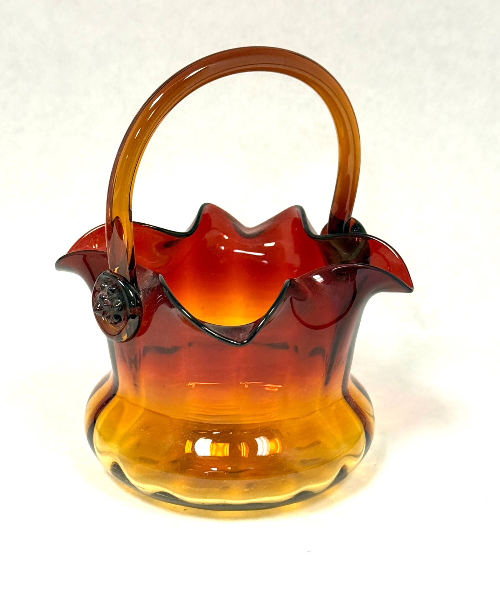 Amberina Basket: Amberina basket; ht. 6". CONDITION: no chips, cracks, repairs, or material defects found, Jaremos attempts to call any material flaw that affects the price, but minor scratches and color variances