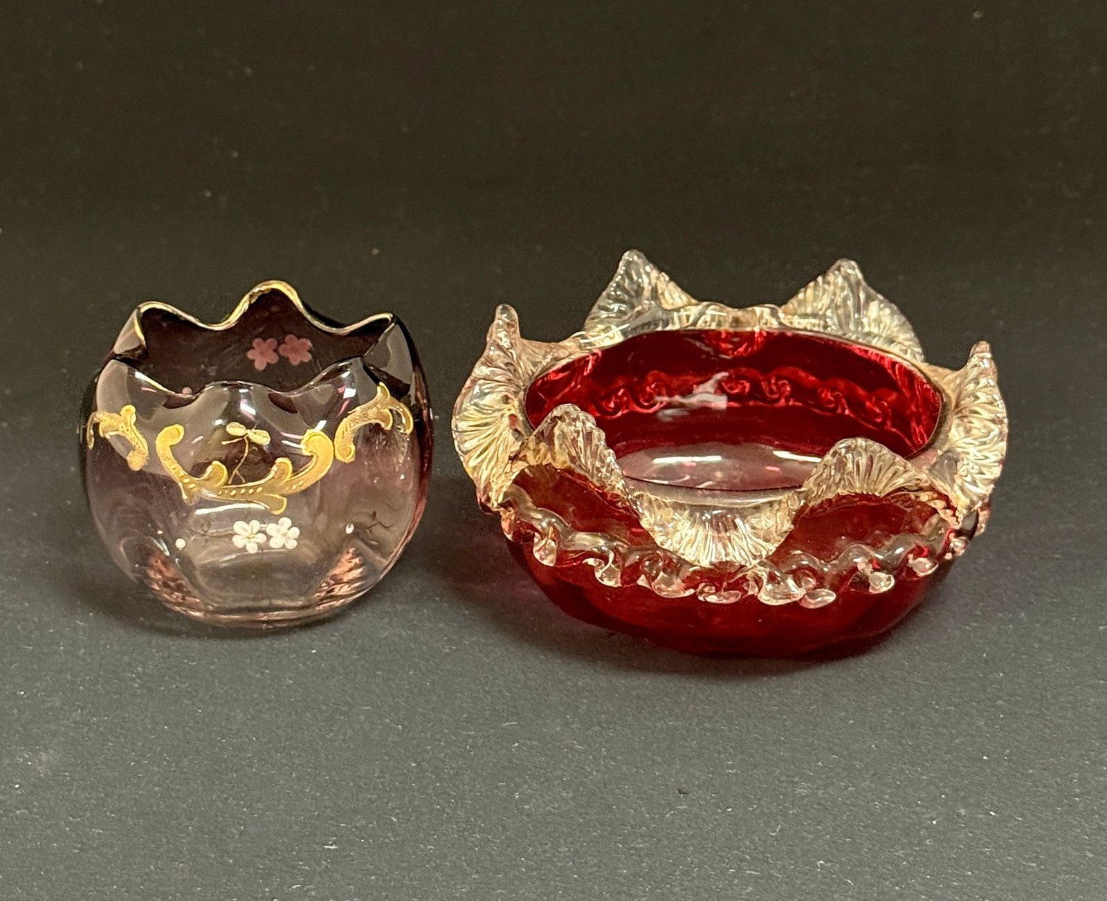 2 Victorian Rose Bowls: 2 Victorian rose bowls one red with rigaree rim with a purple enameled; diameter of largest 4 1/4". CONDITION: no chips, cracks, repairs or material defects found, Jaremos attempts to call any