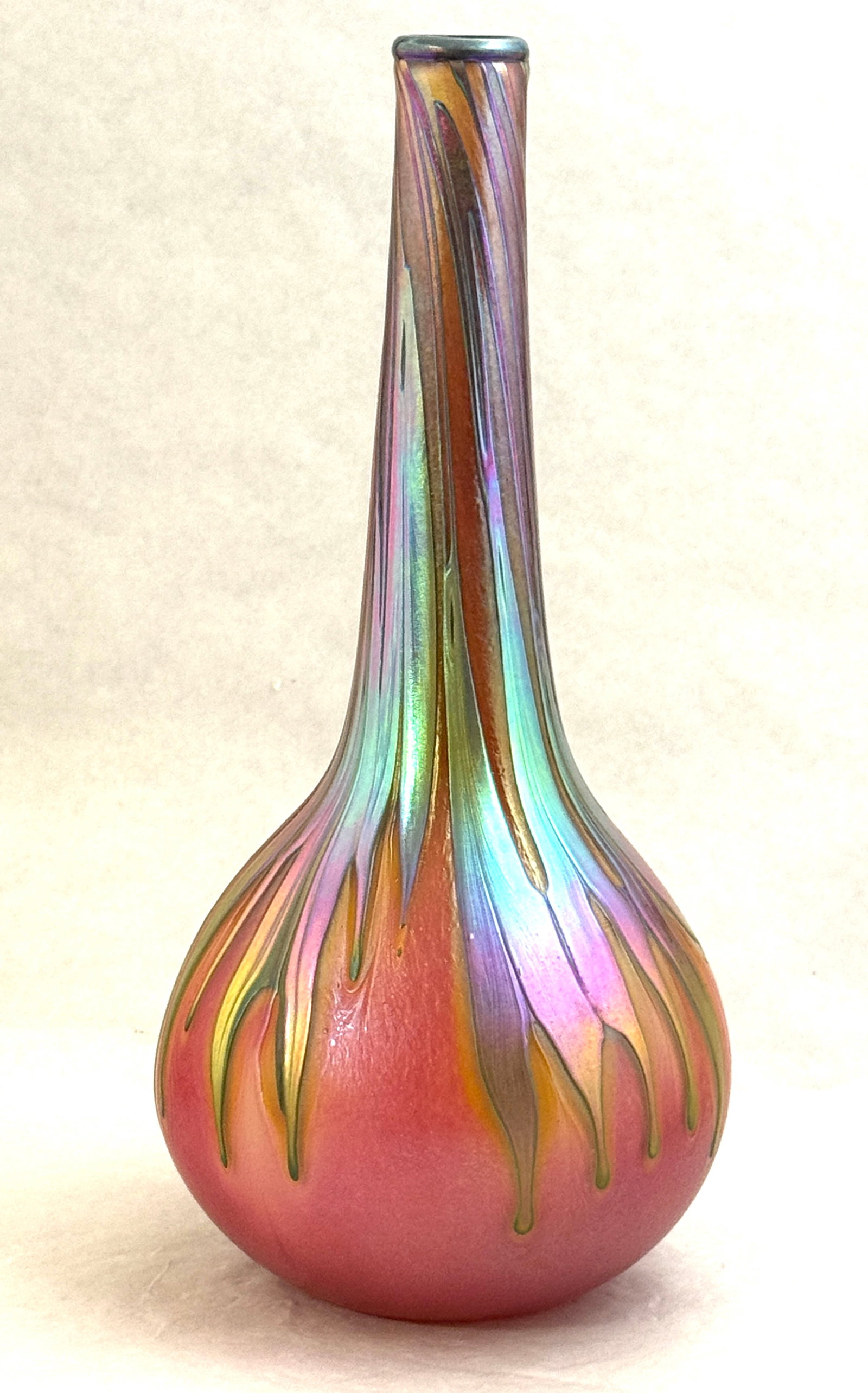 Charles Lotton Pink Vase: Charles Lotton pink vase with cascading blue fox leaves, signed Charles Lotton 1991; ht. 13". CONDITION: no chips, cracks, repairs or material defects found, Jaremos attempts to call any material