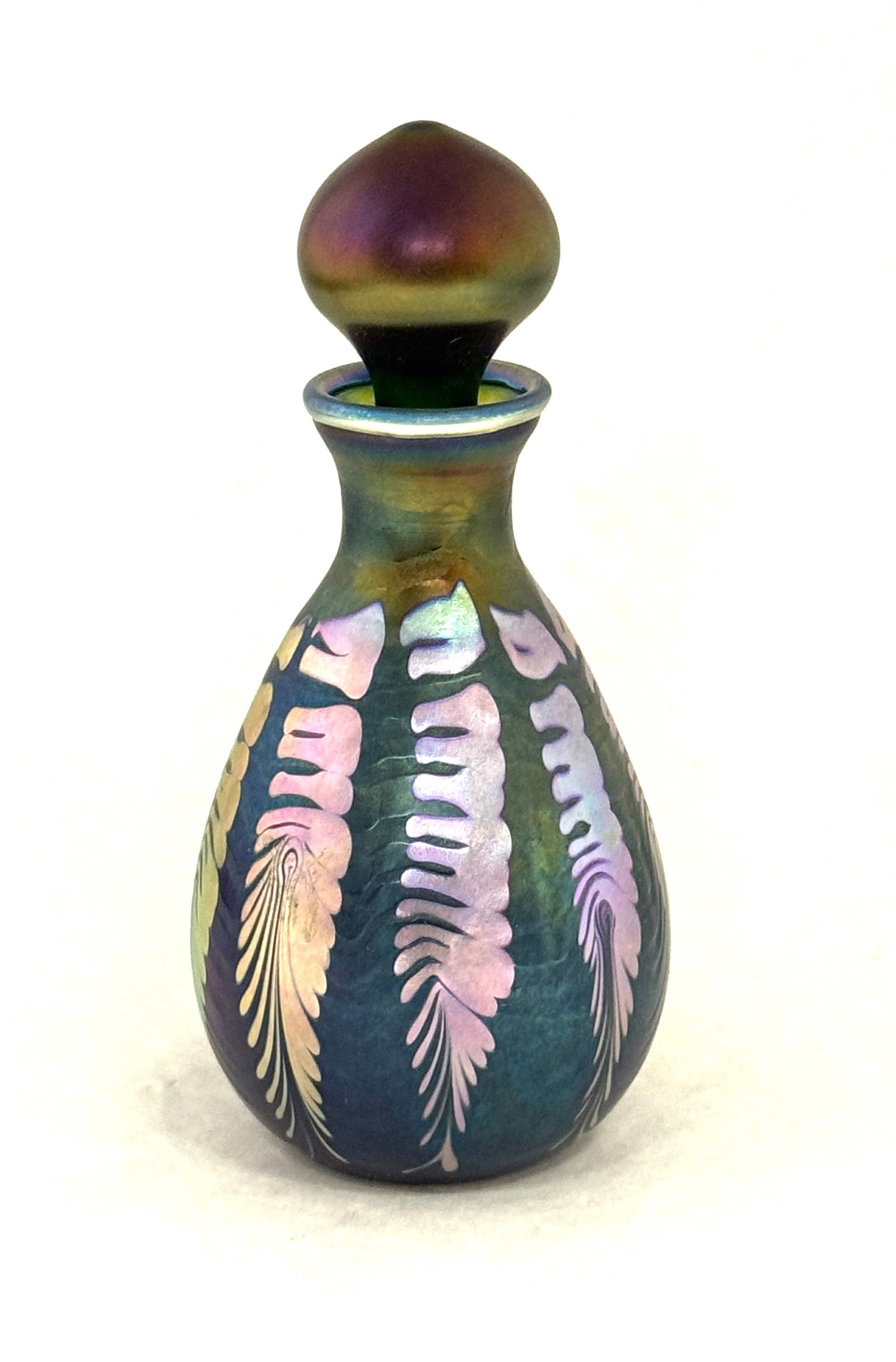 Charles Lotton Blue Perfume: Charles Lotton iridescent blue perfume with a gold zipper design, signed Clarles Lotton 1976, 6" ht. CONDITION: no chips, cracks, repairs, or material defects found, Jaremos attempts to call any