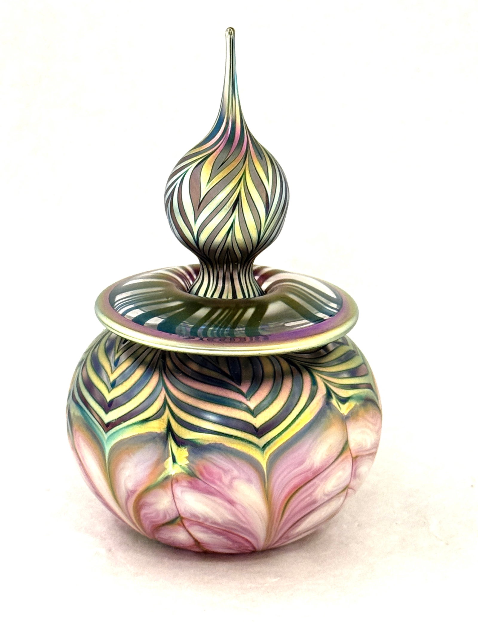 Daniel Lotton Art Glass Perfume: Daniel Lotton art glass perfume decorated with iridescent blue and pink pulled feather, signed Daniel Lotton 1989, 6" ht. CONDITION: no chips, cracks, repairs, or material defects found, Jaremos
